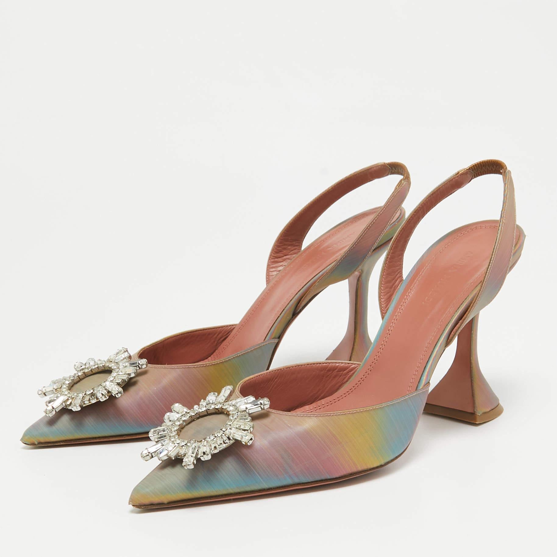 Make a statement with these Amina Muaddi pumps for women. Impeccably crafted  these chic heels offer both fashion and comfort  elevating your look with each graceful step.