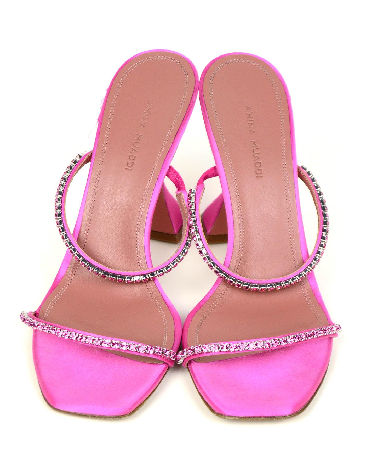 Amina Muaddi Pink Gilda Satin Embellished Sandals Slides sz 39

Made In: Italy
Year of Production: 2020
Color: Pink
Hardware: Silvertone
Materials: Satin and crystal
Closure/Opening: Slide on with elastic at top strap
Overall Condition: Very good.