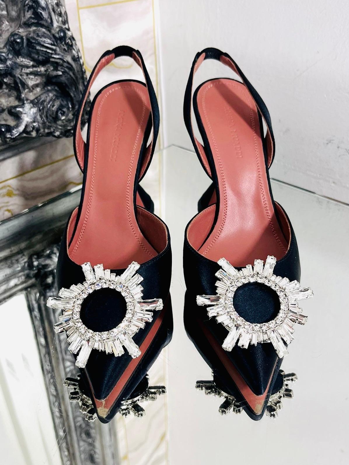 Amina Muaddi Satin & Crystal Heels

Begum satin slingback heels in black with crystal embellished large brooch style

feature to each shoe. Sculptured heels. Rrp £665.

Size - 35.5

Condition - Excellent

Composition - Satin, Crystal

Comes With -