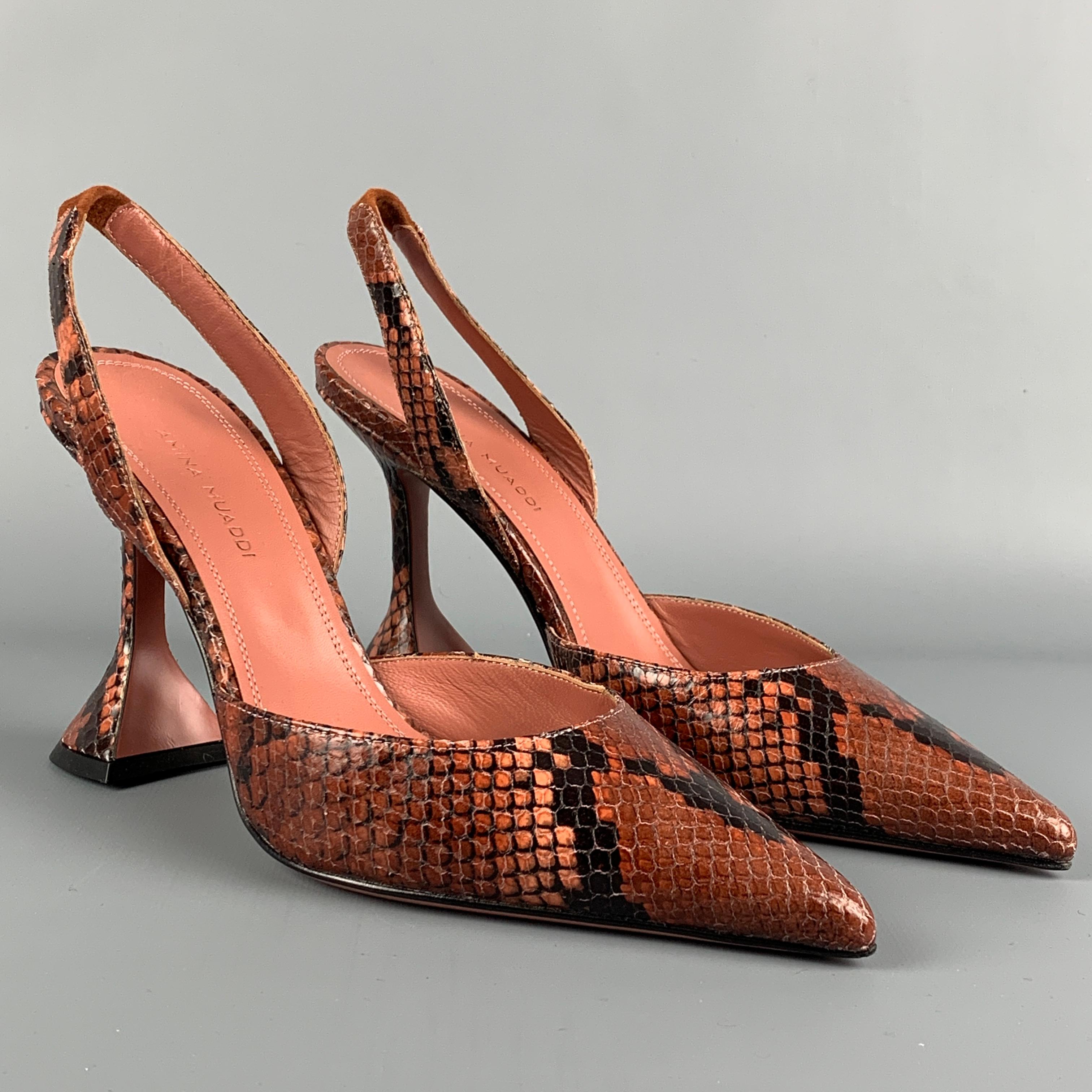AMNIA MUADDI pumps comes in a brown snake skin leather featuring a slingback, pointed toe, and a hourglass heel. Made in Italy. 

Brand New. 
Marked: 37.5
Original Retail Price: $970.00

Measurements:

Heel: 4 in. 