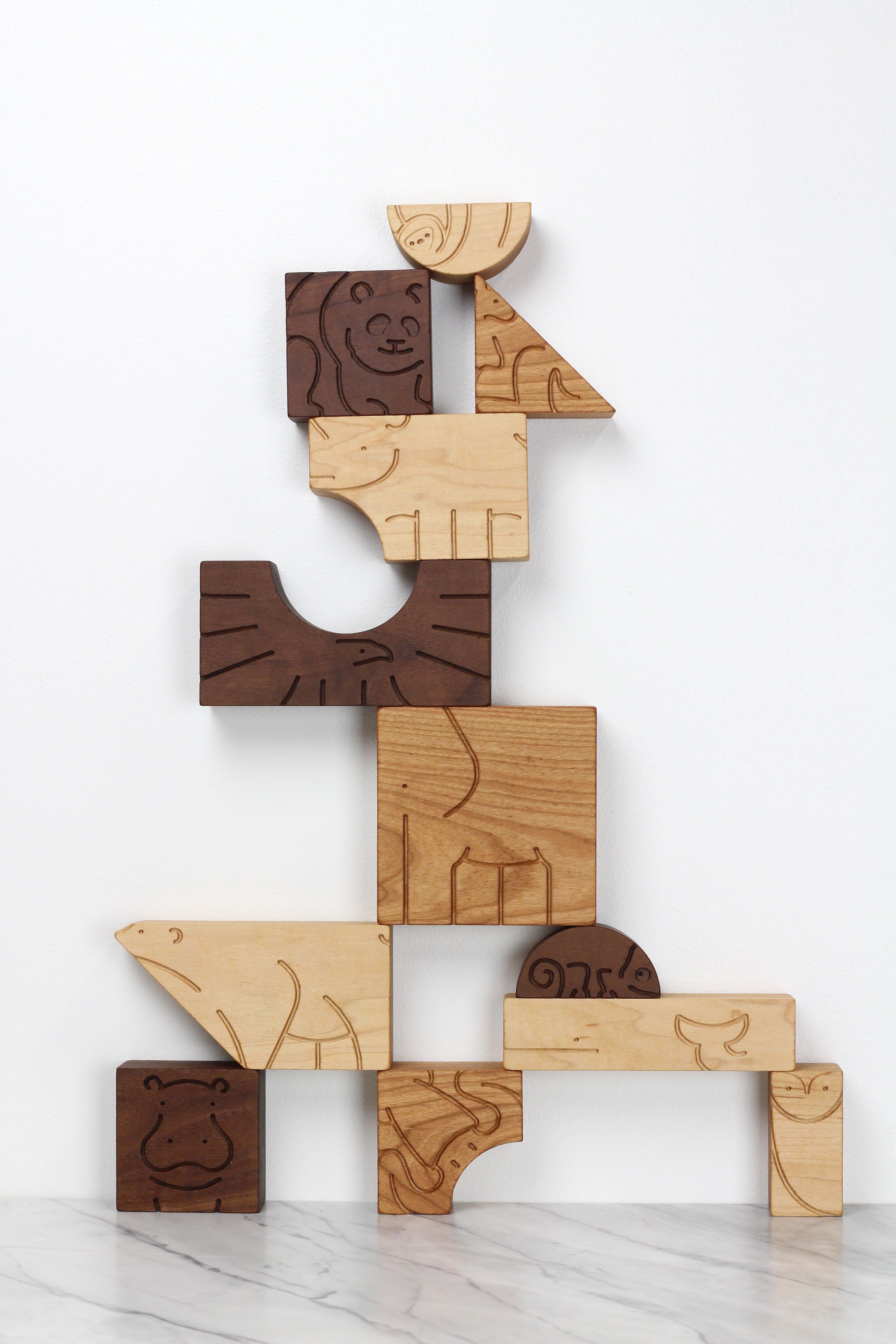 Crafted from maple, cherry, and walnut, the “Aminal” Blocks set contains 12 unique animal sculptures. The set includes an owl, hippo, kangaroo, polar bear, squid, chameleon, rhino, panda, eagle, sloth, whale, and elephant.

The set derives its