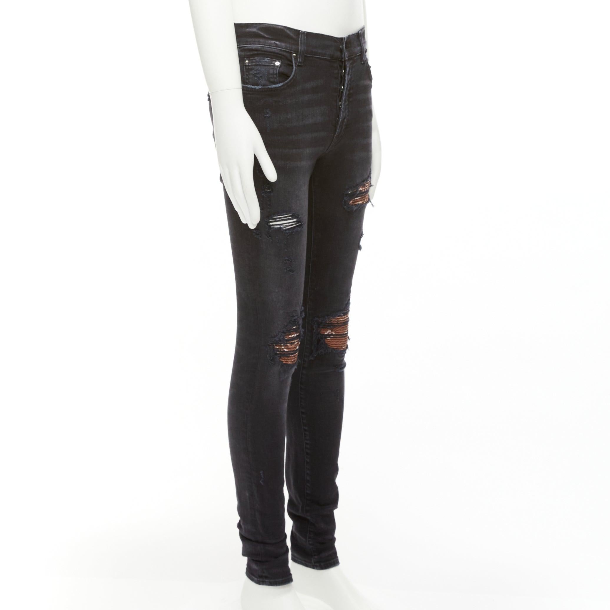 Nero Amiri jeans skinny lavati neri antracite con inserti plissettati marroni 31