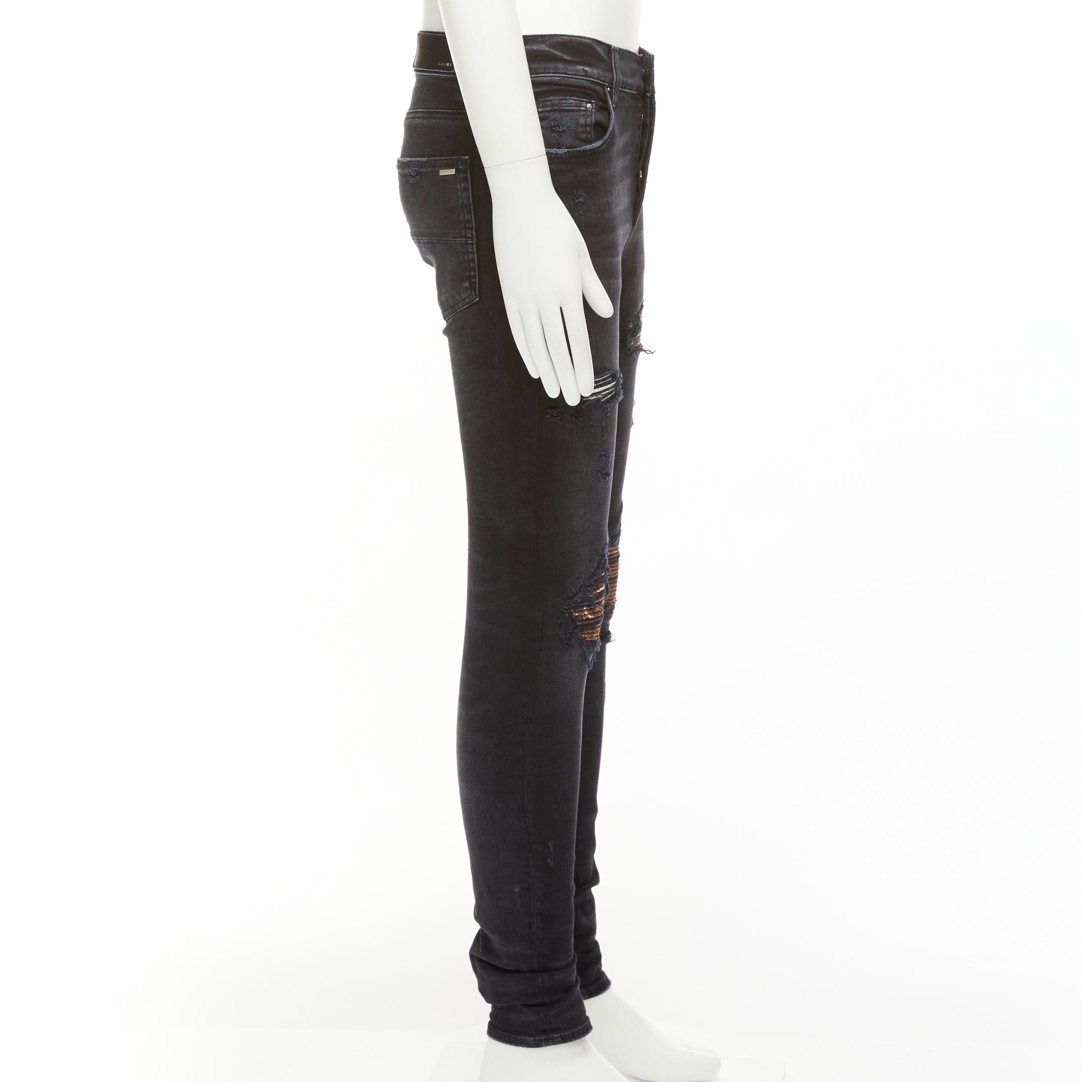 Amiri jeans skinny lavati neri antracite con inserti plissettati marroni 31