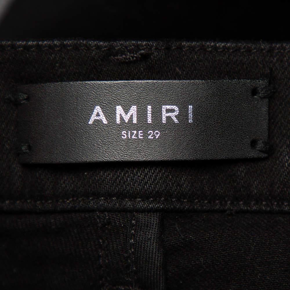 black amiri jeans with zipper