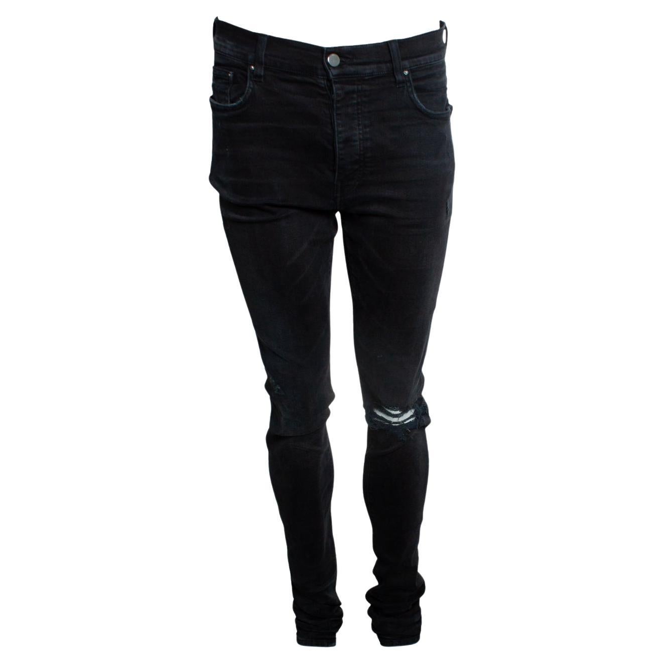 Amiri, black distressed jeans For Sale