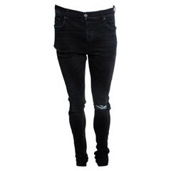 Amiri, jeans neri consumati