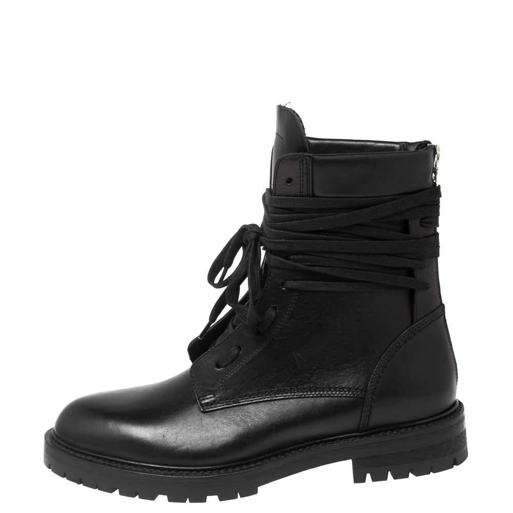 Give an edgy spin to your wardrobe with these combat boots from Amiri. Meticulously crafted from leather, the black boots have neatly placed laces, leather insoles, and rubber soles. Team with an all-black outfit for that chic, grunge look.

