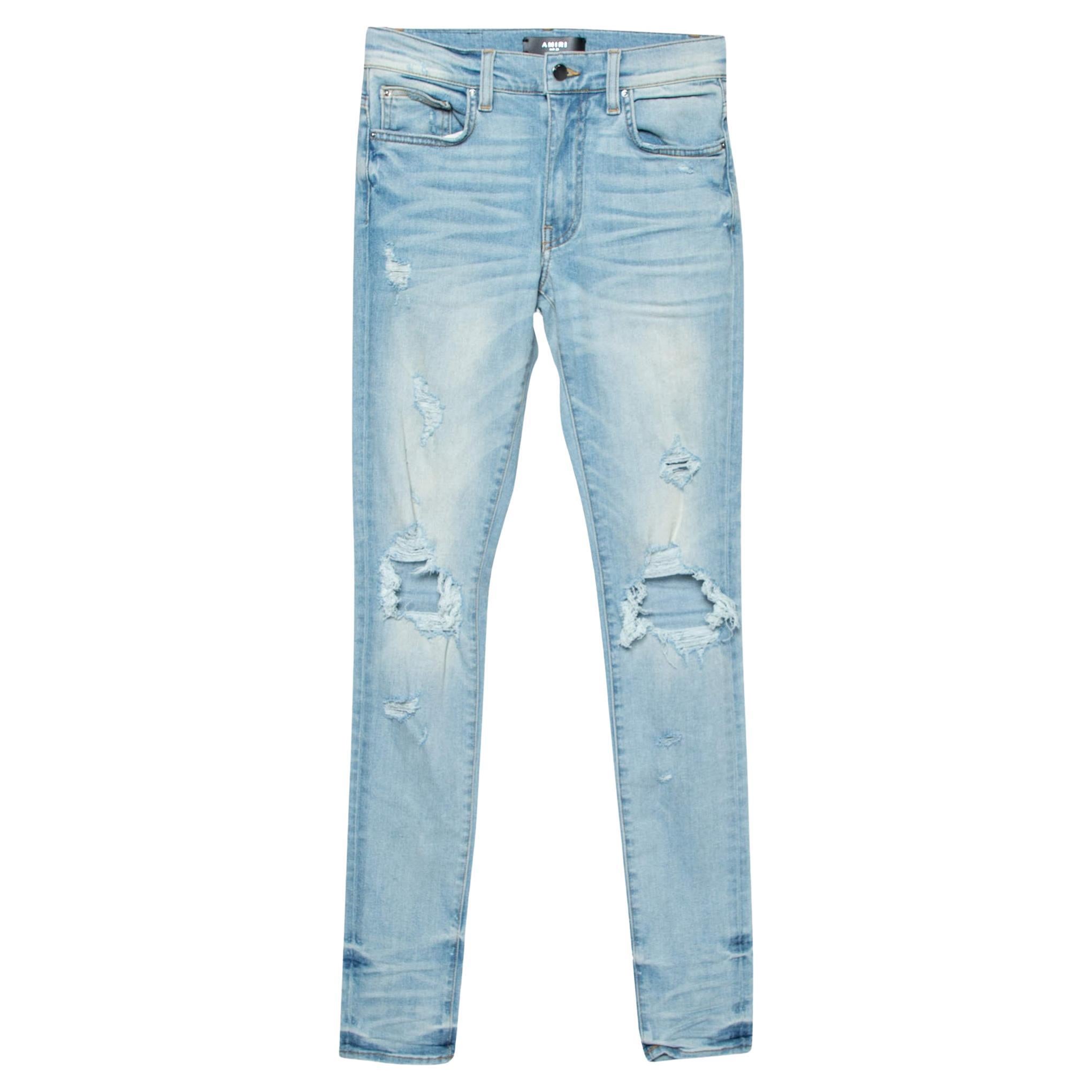 Amiri Indigo Light Wash Denim Distressed Skinny Jeans XS For Sale