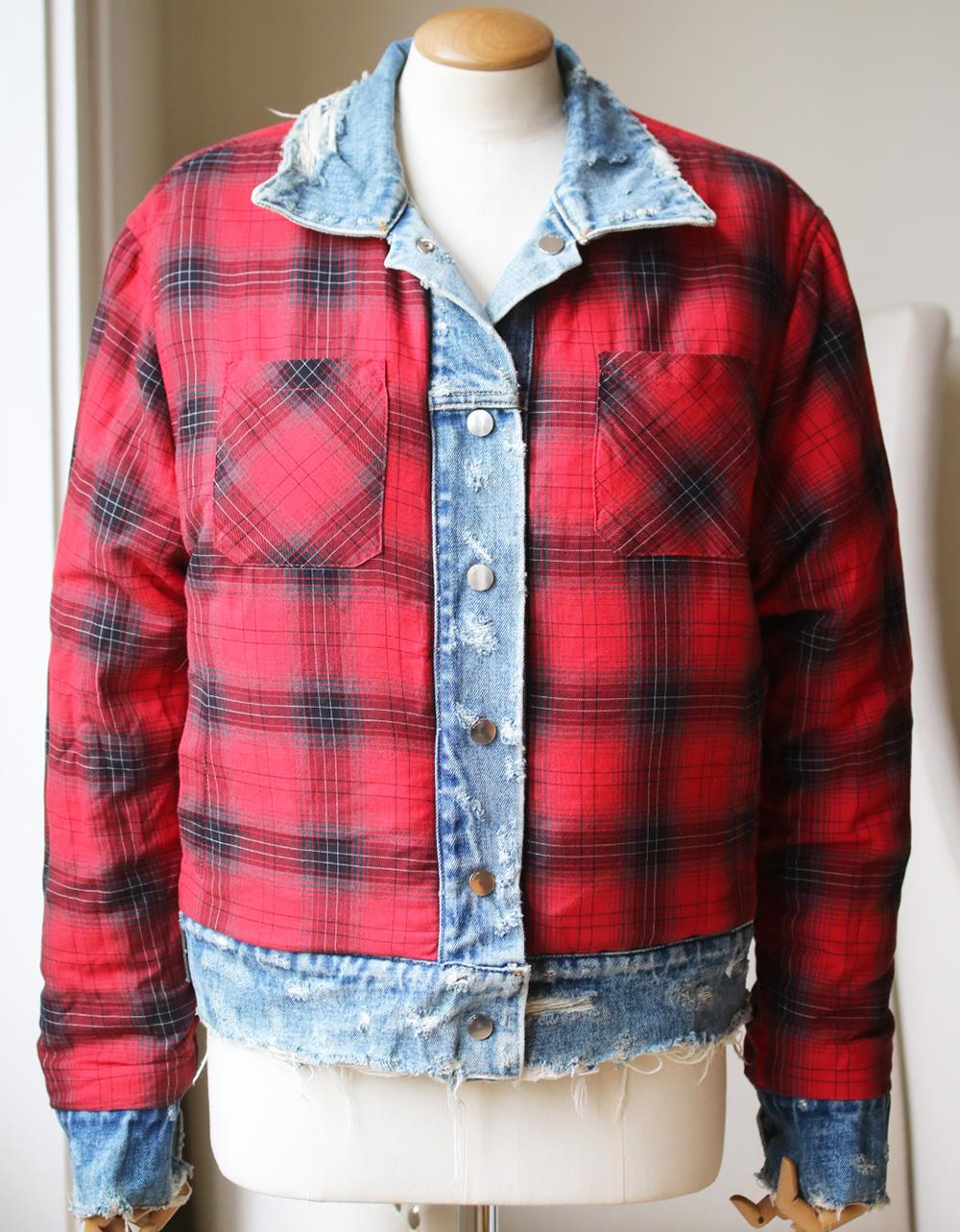 Reversible bomber jacket by Amiri with distressed denim and checked cotton flannel.
Blue denim and red flannel. 
Snap button fastenings through front.
100% Cotton; contrast: 85% cotton 15% cashmere.

Size: UK 8 (US 4, FR 36, IT 40)

Condition: As