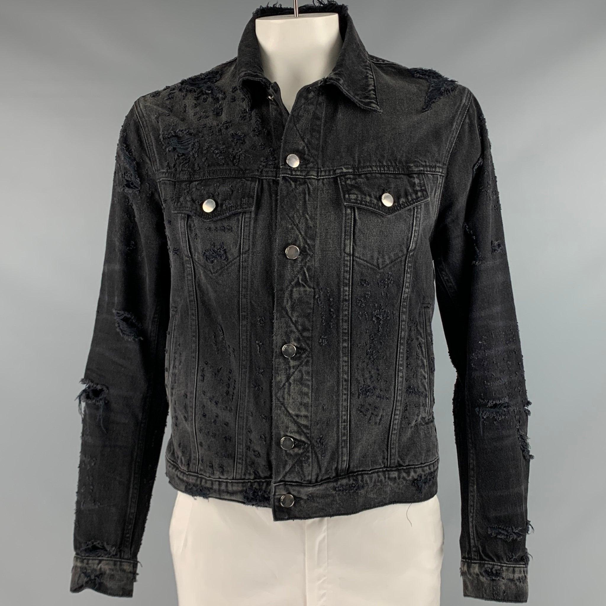 AMIRI jacket
in a black and grey cotton fabric featuring a trucker style, distressed details, two patch pockets, and a button closure. Made in USA.Excellent Pre-Owned Condition. 

Marked:   L 

Measurements: 
 
Shoulder: 18 inches Chest: 42 inches