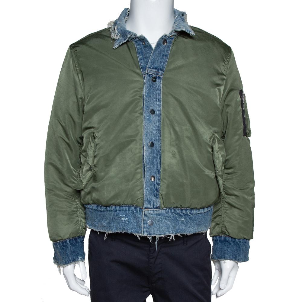 Grab this stylish reversible bomber jacket by Amiri and elevate your casual style instantly. Crafted from 100% cotton, this two-toned denim jacket comes in a lovely shade of blue. It is styled with a button-front, four pockets, simple collar,