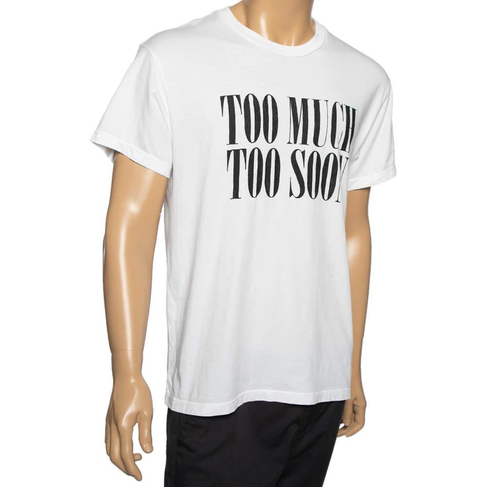 Redefine your casual style with this T-shirt from the House of Amiri. It is tailored using white cotton fabric, enhanced with a 'Too Much Too Soon' print on the front. It has short sleeves. This T-shirt can be paired with jeans for a smart look. 