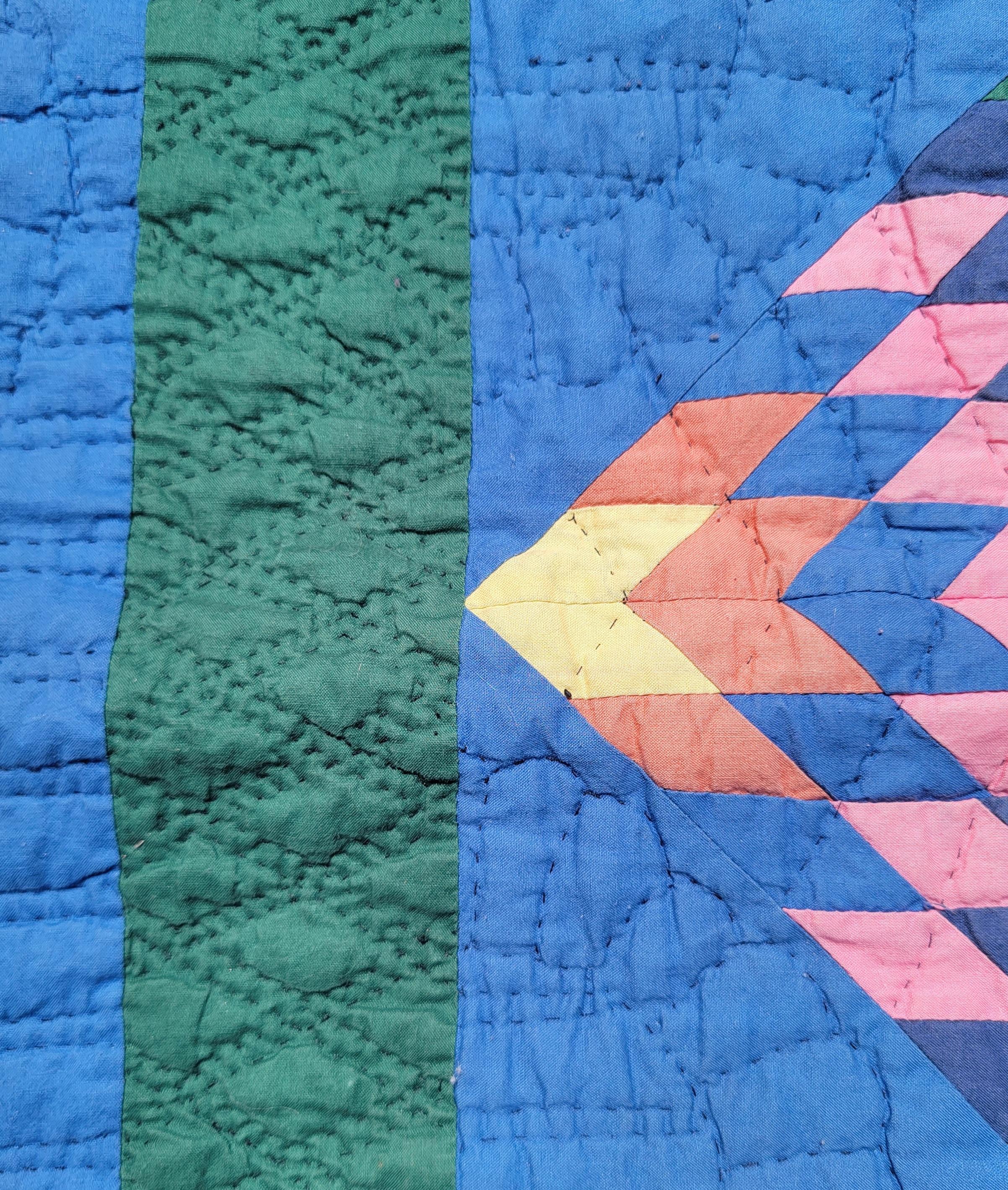 This fine Amish quilt comes from Ohio and has very fine quilting and piece work.The condition is very good and has a great saw tooth binding.