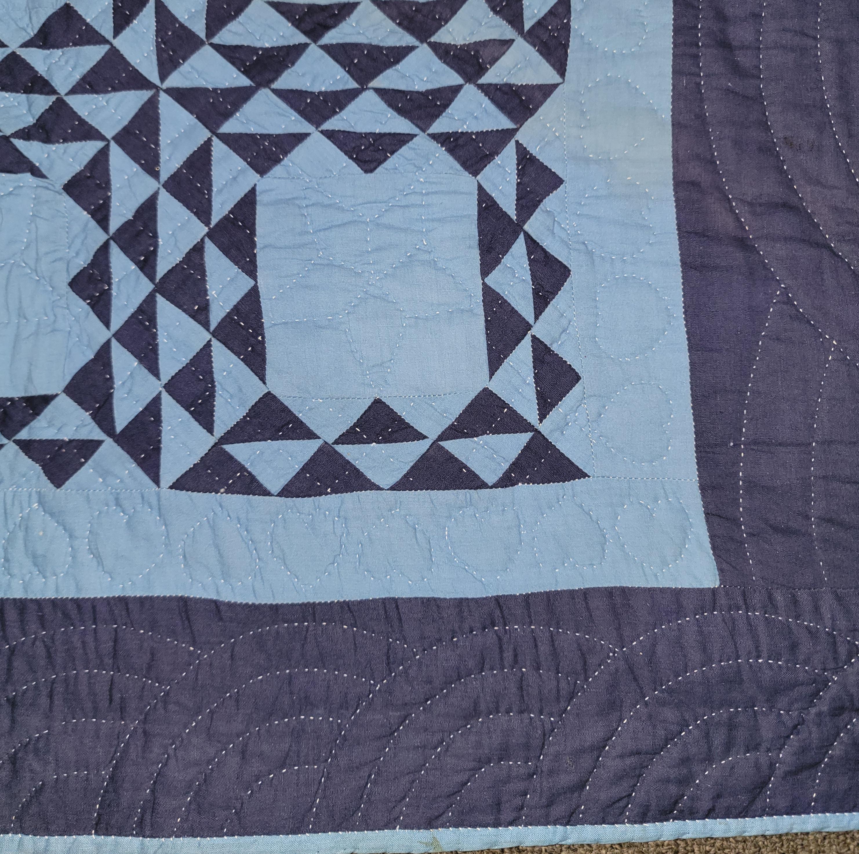 20Thc Ohio Amish crib quilt in ocean waves pattern.The back round a royal blue and light blue small pieces. The condition is very good.This is a rare and fine pattern from the mid West.