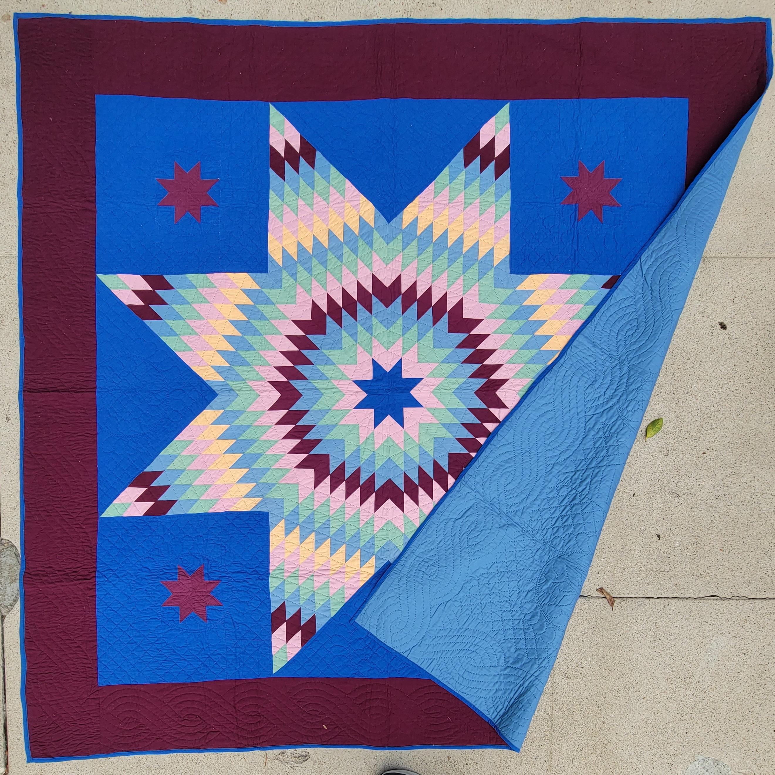 This fun and vibrant Amish star quilt is in fantastic condition.It is made from cotton and wool combo. The maroon border and pieces are wool the remainder are cotton. The condition is very fine along with the piecing & quilting.
