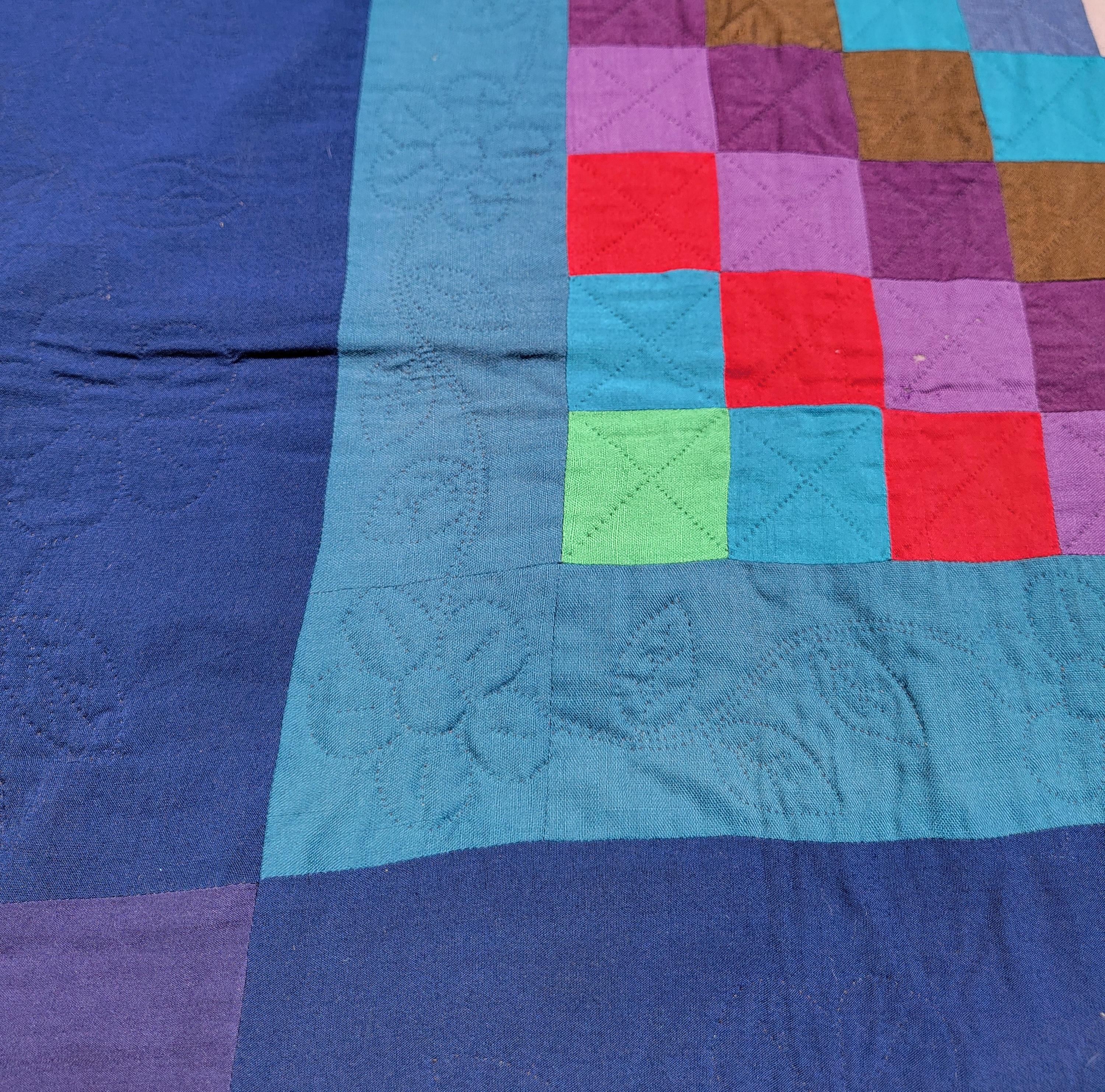 This fine wool and mixed fabrics trip around the world Amish quilt was found in Lancaster County,Pennsylvania.It is mostly wool and mixed cottons as well.The condition is fantastic.