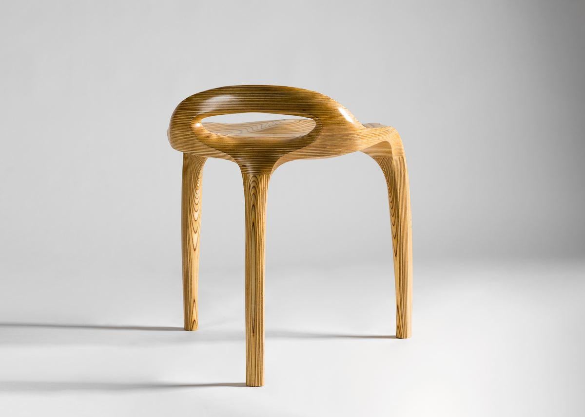 Ammar Kalo's Stratus possesses a set of flexed arms, cushions upholstered in camel leather, and a frame in an extraordinarily textured birch. But it is more than the sum of its extraordinary parts--it is, rather, a symphony of complementary