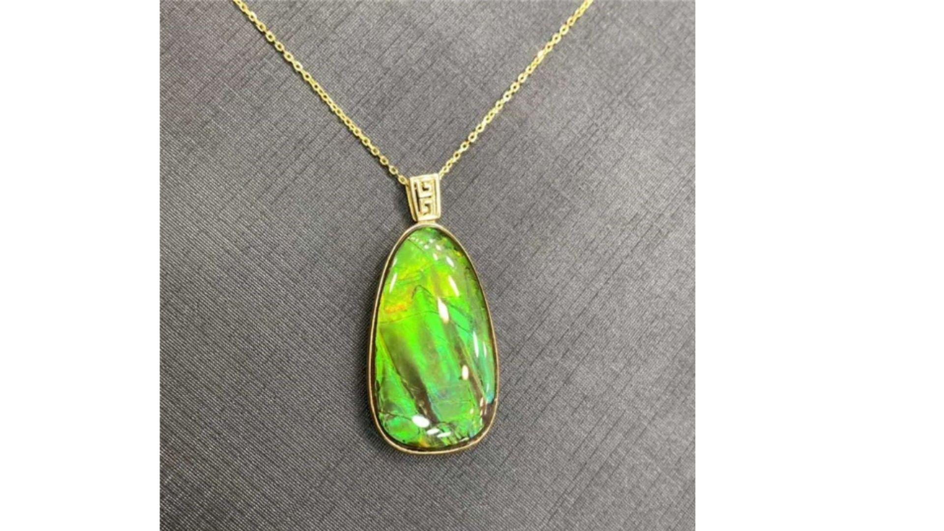 
Ammolite is a rare iridescent gemstone from a fossilized extint sea creature known as a ammountes. It shows off bright colors yellow orange etc

Found only in the Bearpaw formation that extends from Alberta to Saskatchewan in Canada and to Montana
