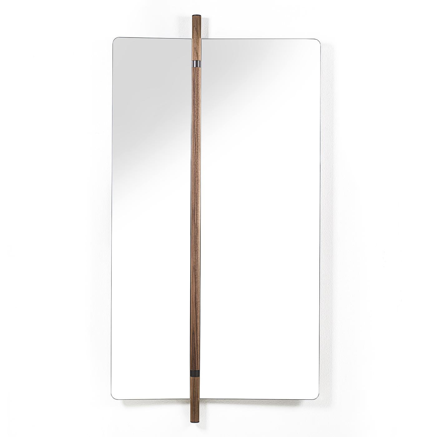 Mirror Amnesia composed of 2 folding glass mirros with solid walnut back.
With a central pole in solid walnut with metal parts in grey finish included.
92cm when opened and and 57cm when folded.
