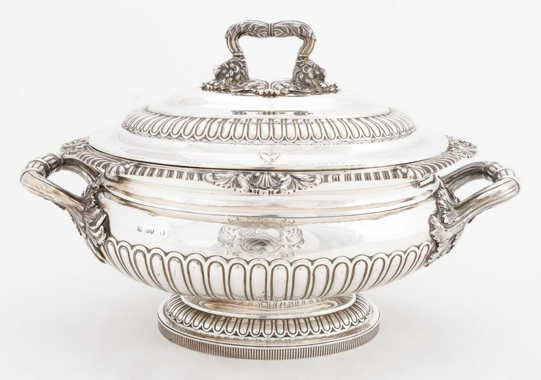 Joseph Craddock and William Ker Reid, 1817. Sterling silver lidded George III tureen bearing Langton family coat of arms. Appropriately marked. Dimensions: Height 10 3/4
