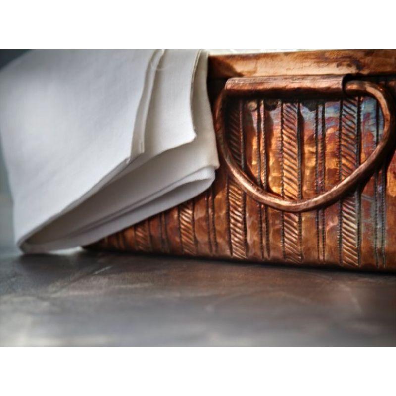 This is a real work of art. Amoretti Brothers hammered copper roasting pan with hand-engraved lines decor. Hand-hammered by talented artisans, this roaster is hardworking and great-looking enough to turn your most humble dish into an elegant dining