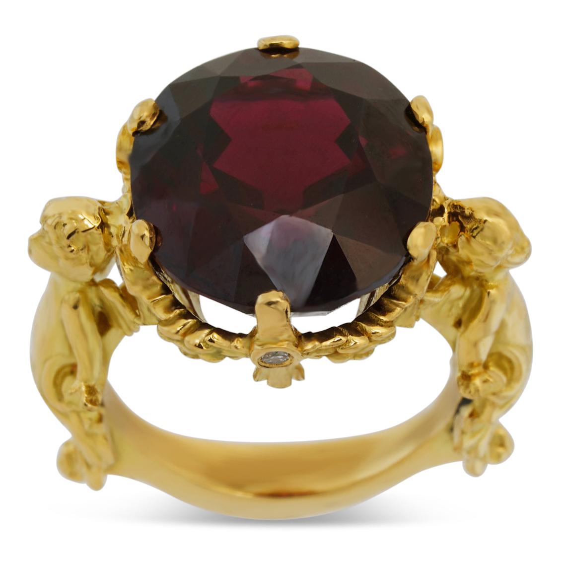 Oval Cut Amorini Ring in 18 Karat Yellow Gold with Garnet and White Diamonds
