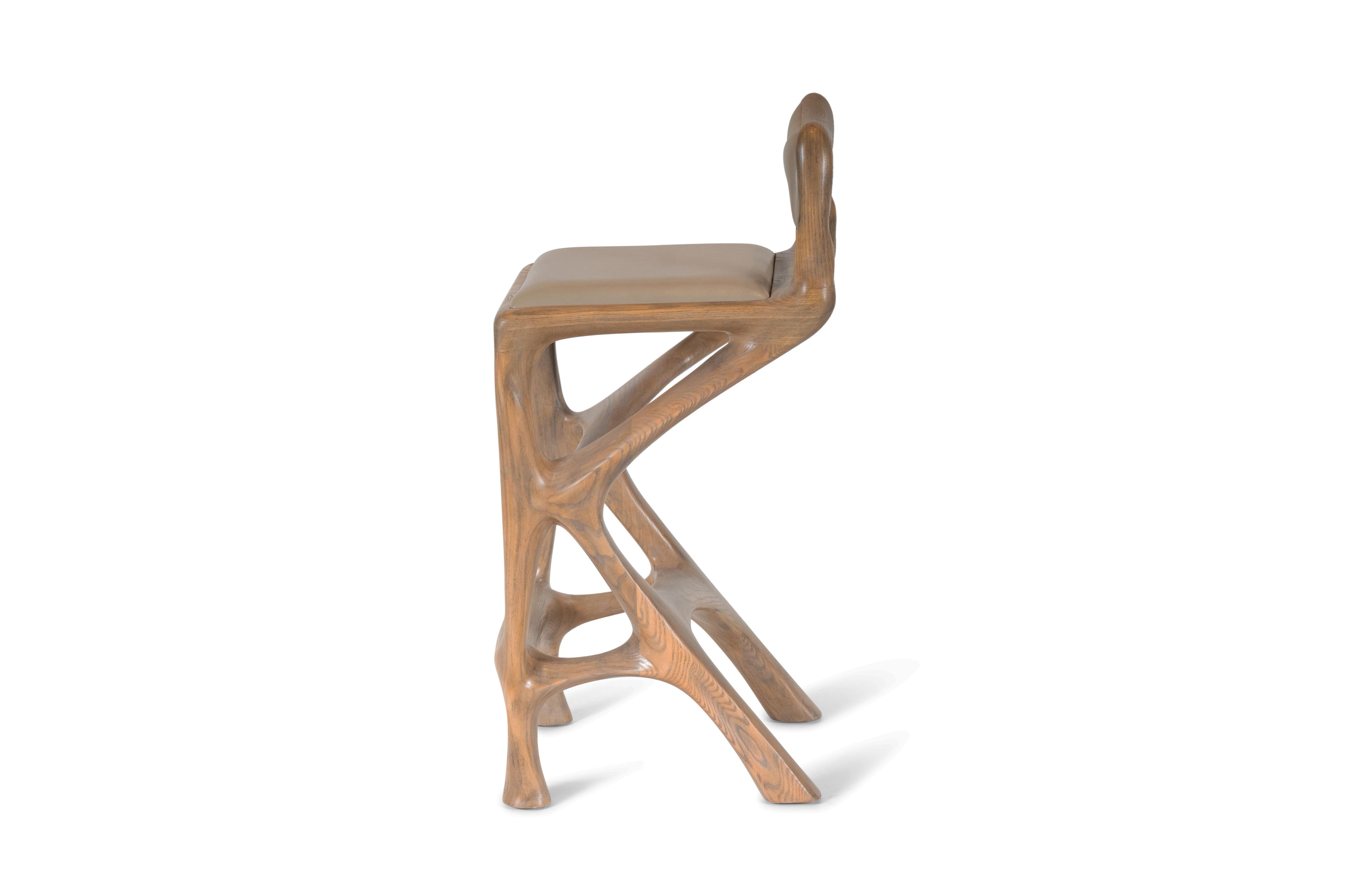 Barstool designed by Amorph made out of solid ashwood and leather. Stain color: Rusted walnut
Dimension: 34