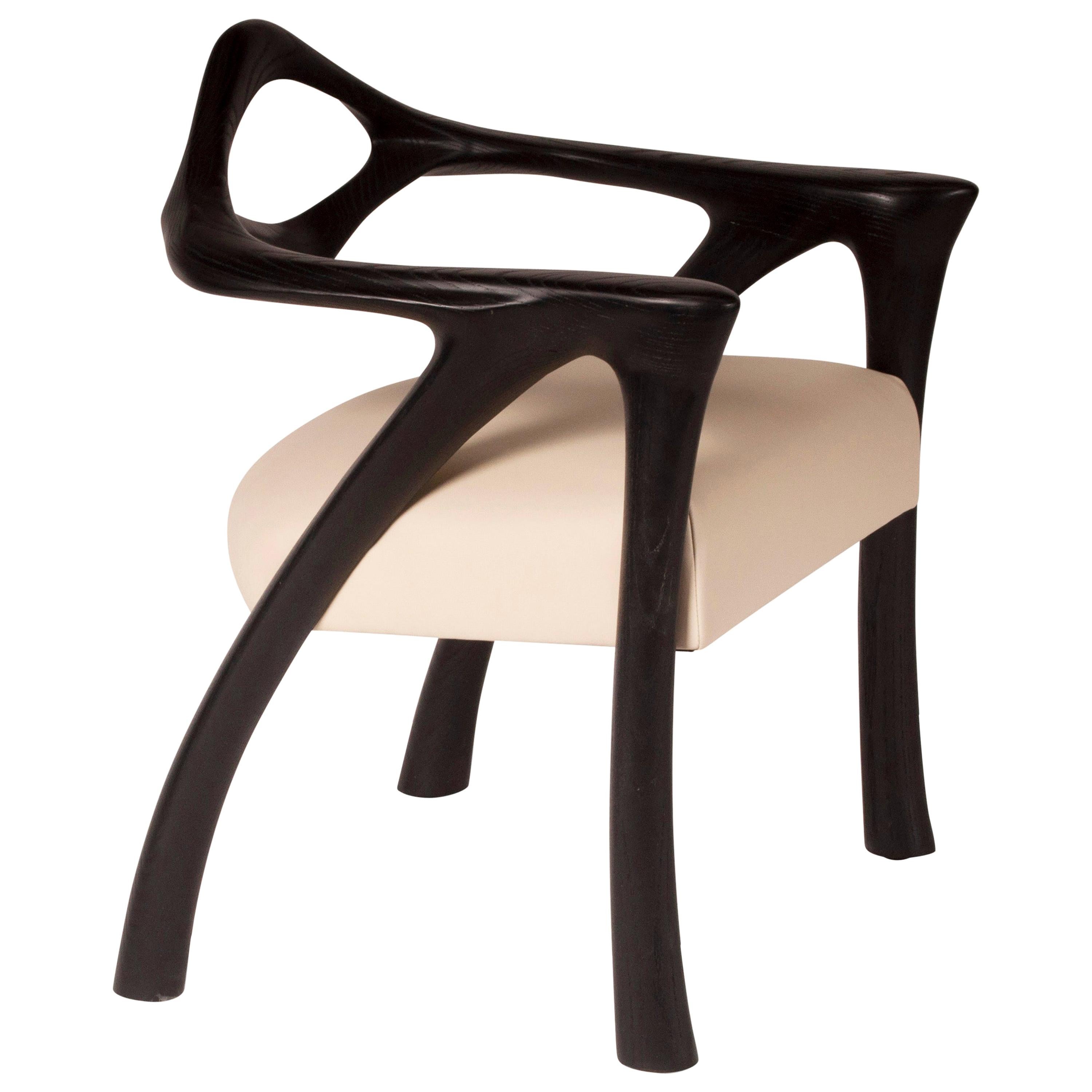 Darcey dining chair is made from ashwood with off-white leather.
We ask designer to provide COM or COL

About Amorph: 
Amorph is a design and manufacturing company based in Los Angeles, California. We take pride in hand crafted designs connected to