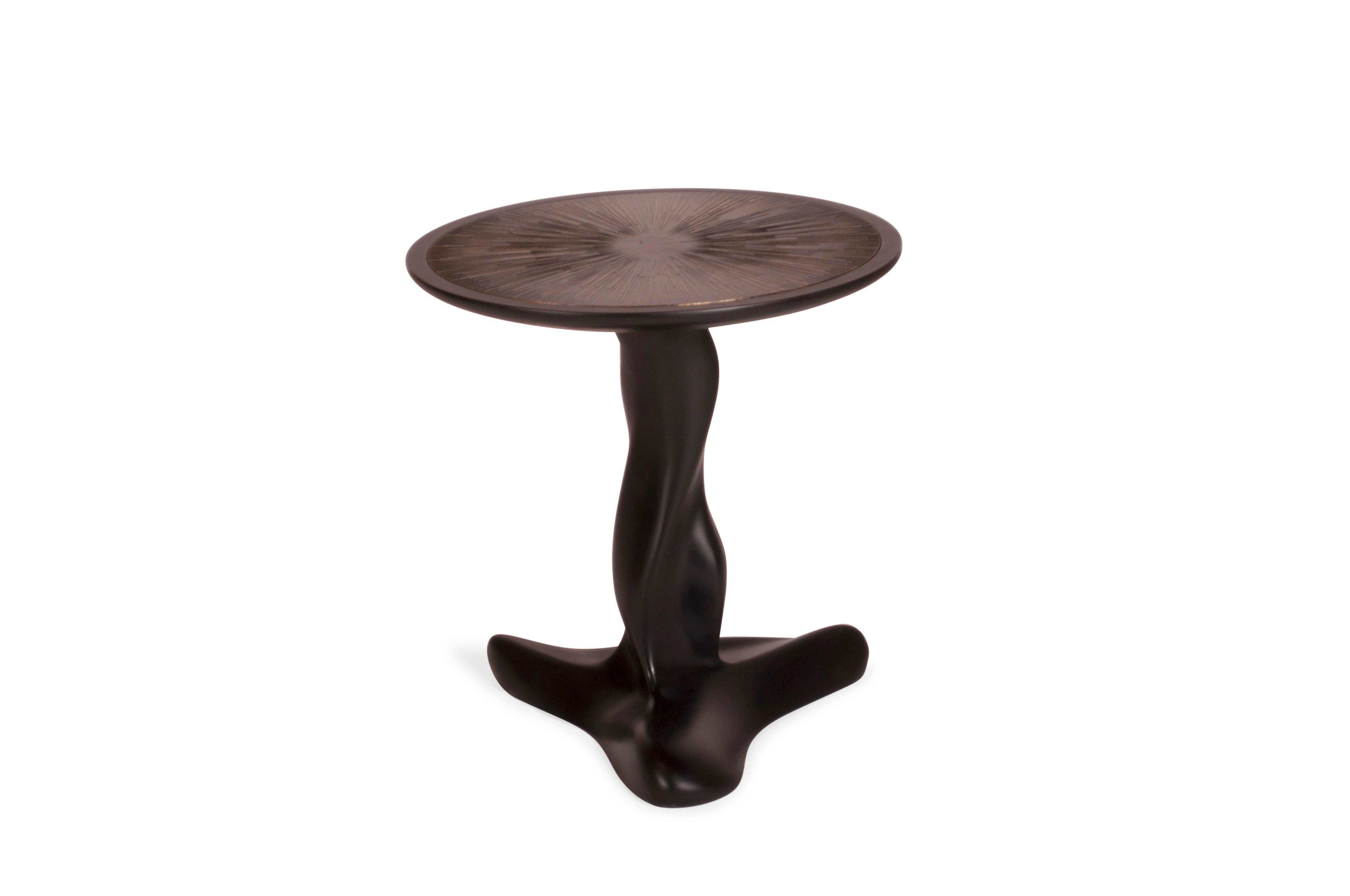 The Helios side table is a stunning piece of furniture that exudes luxury and sophistication. Its unique and bold design sets it apart from other side tables on the market, making it a standout piece in any contemporary home. Combining both artistry