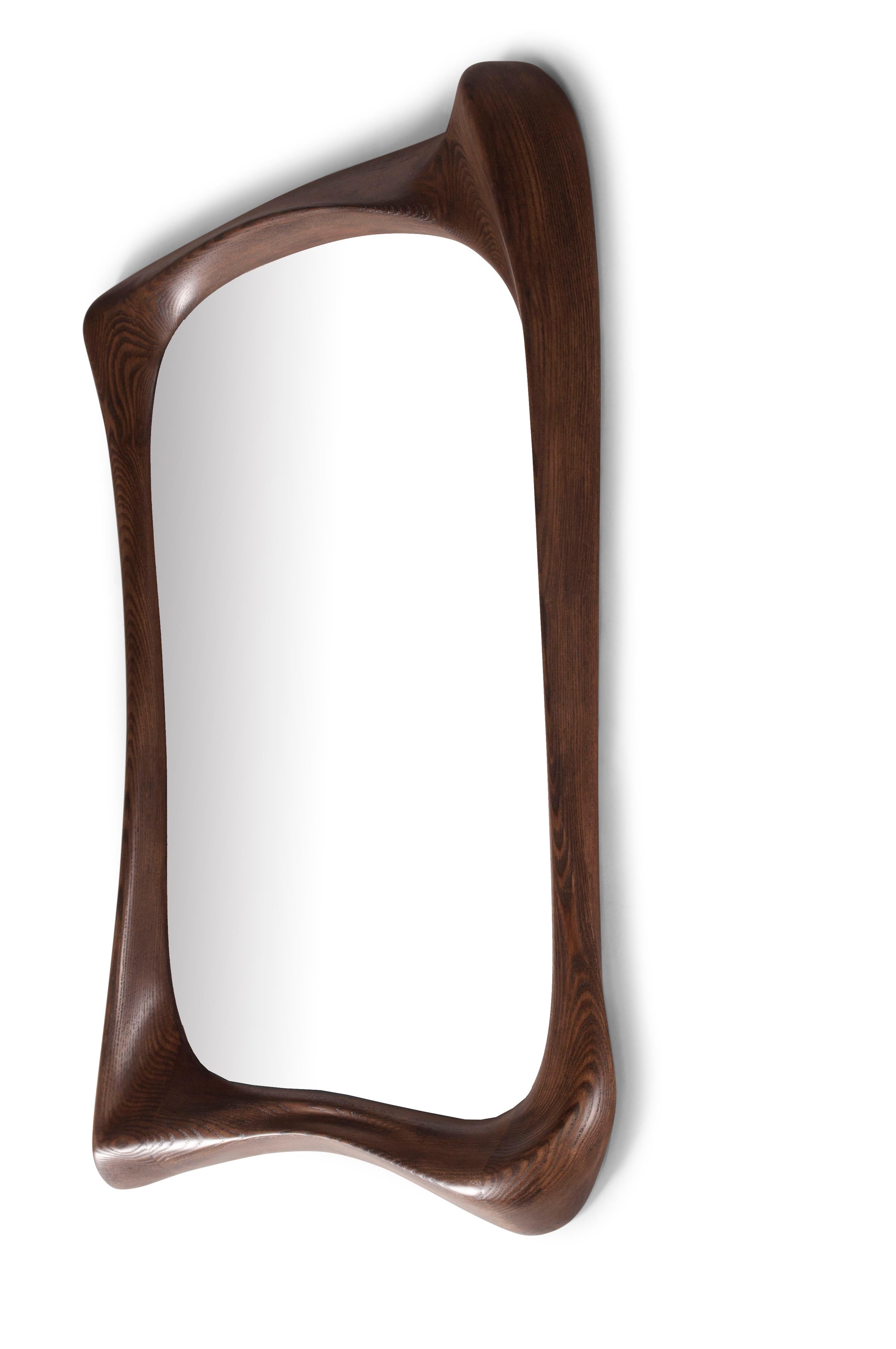 Unique style mirror, Solid wood with graphite walnut stained finish 

About Amorph: 
Amorph is a design and manufacturing company based in Los Angeles, California. We take pride in hand crafted designs connected to technology to create