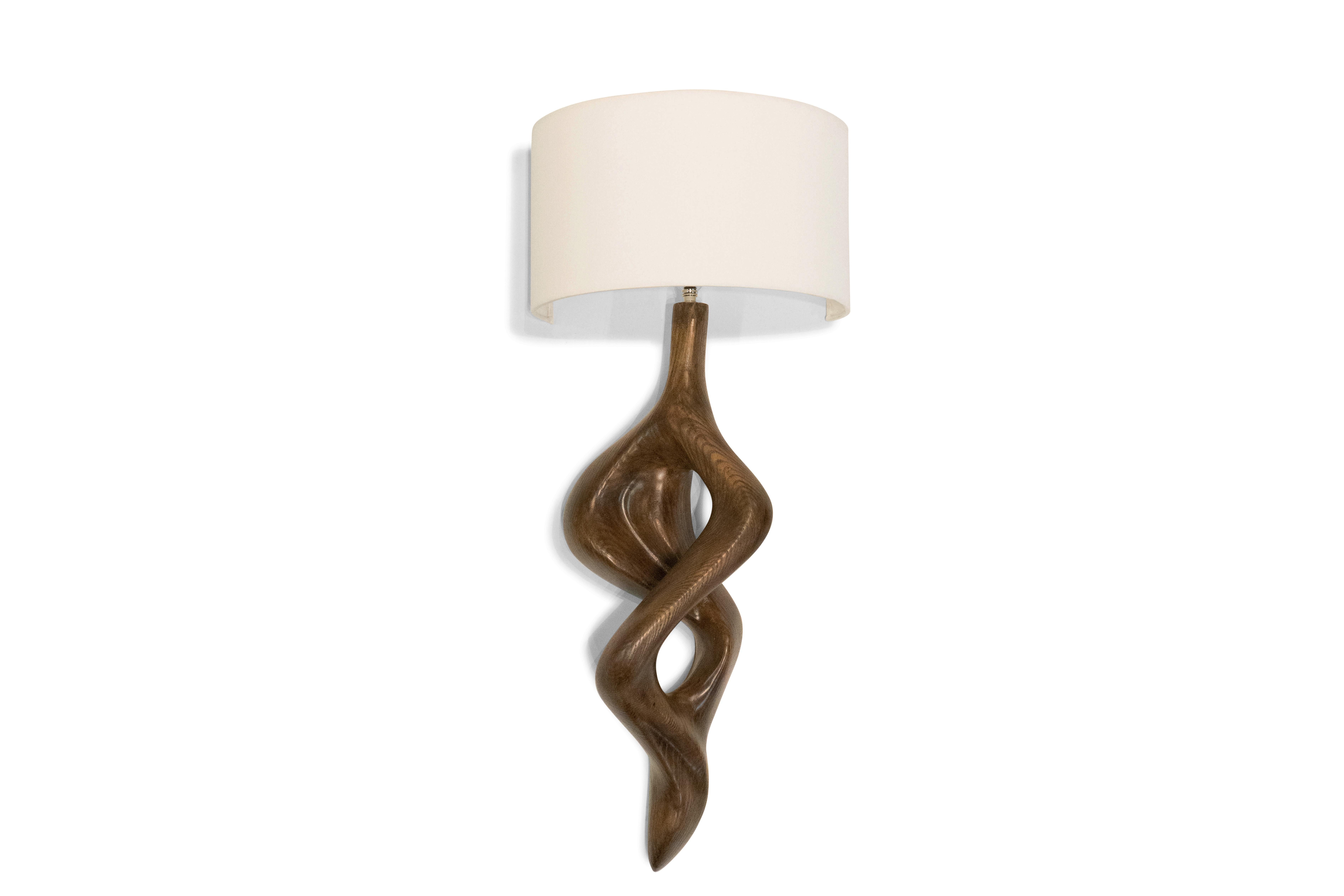Carved Amorph Nomi Sconce Graphite Walnut stain on Ash wood with Ivory Shade For Sale