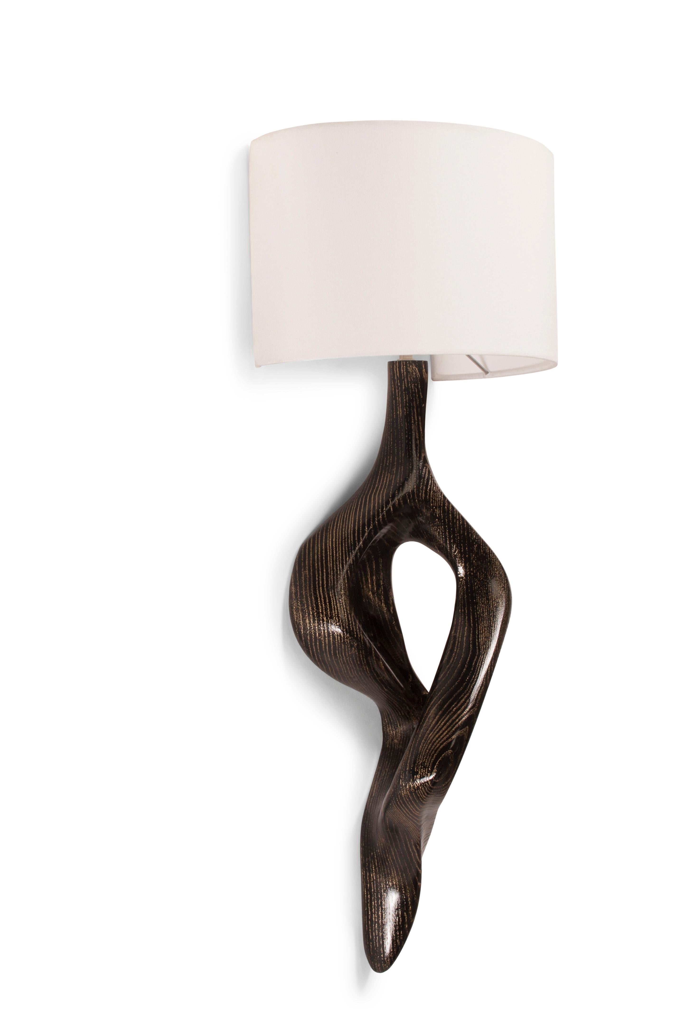 Carved Amorph Nomi Sconces Golden Ebony stain on Ash wood with Ivory Silk Shade For Sale