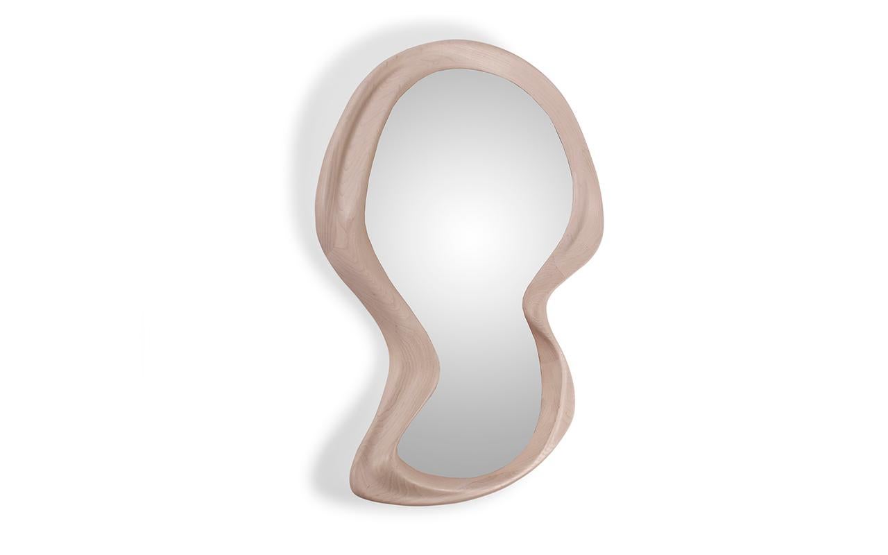 The Rose bean shape mirror is a perfect addition to modern and contemporary homes. Its unique frame design, with its organic and undulated surface, adds a touch of elegance and sophistication to any space. The mirror is available in various sizes