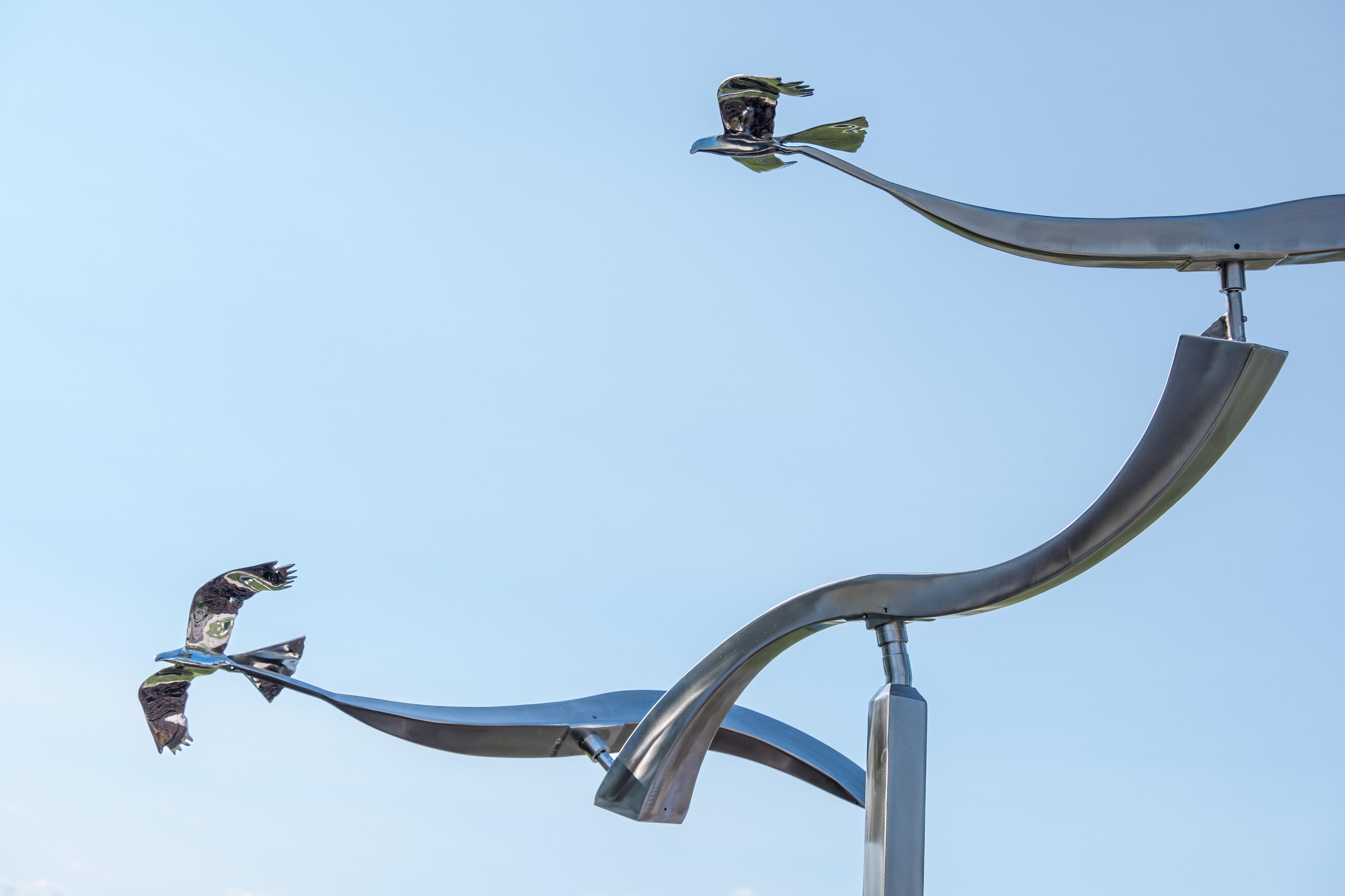 Amos Robinson Figurative Sculpture - Crossing Paths (Birds in Flight) - figurative, kinetic stainless steel sculpture
