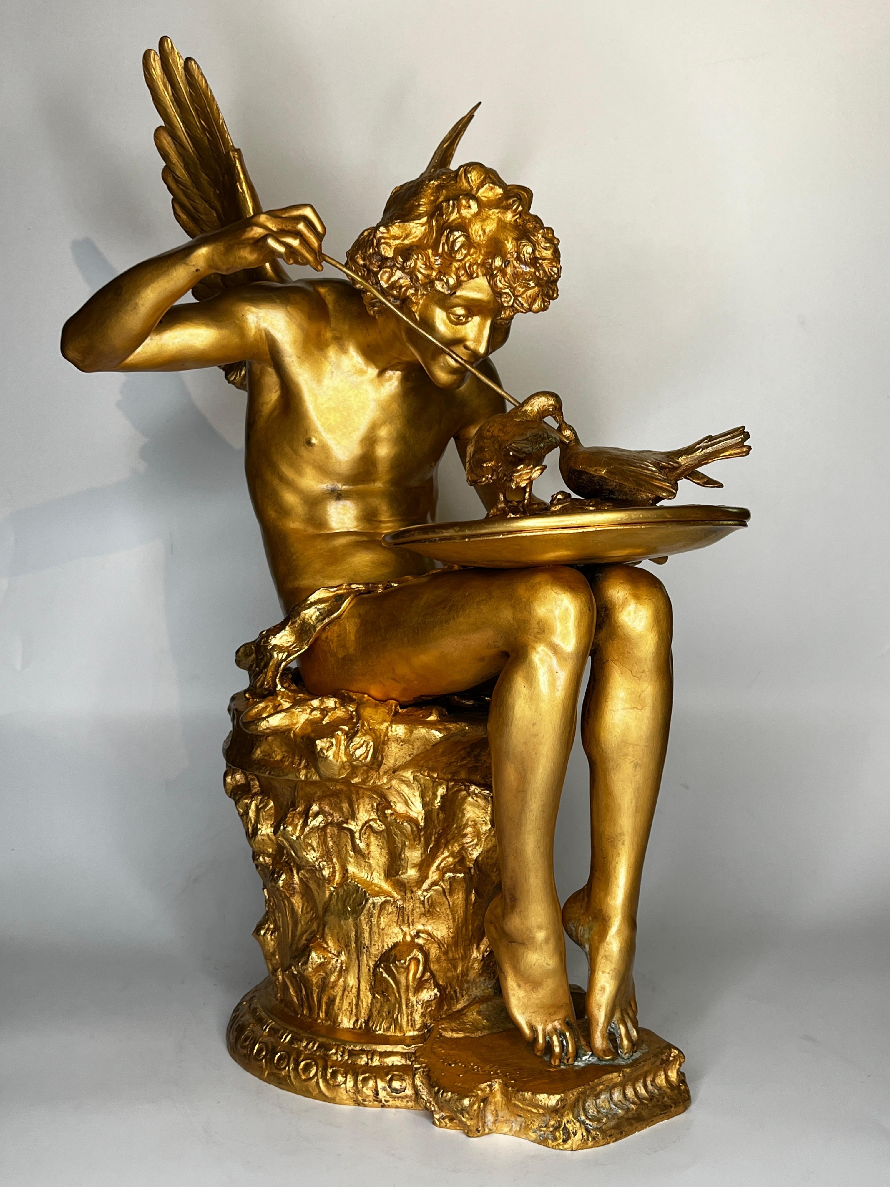 Our gilt bronze sculpture after Jean Antoine Injalbert (1845-1933) is known as Amour aux Colombes (Love with Birds).