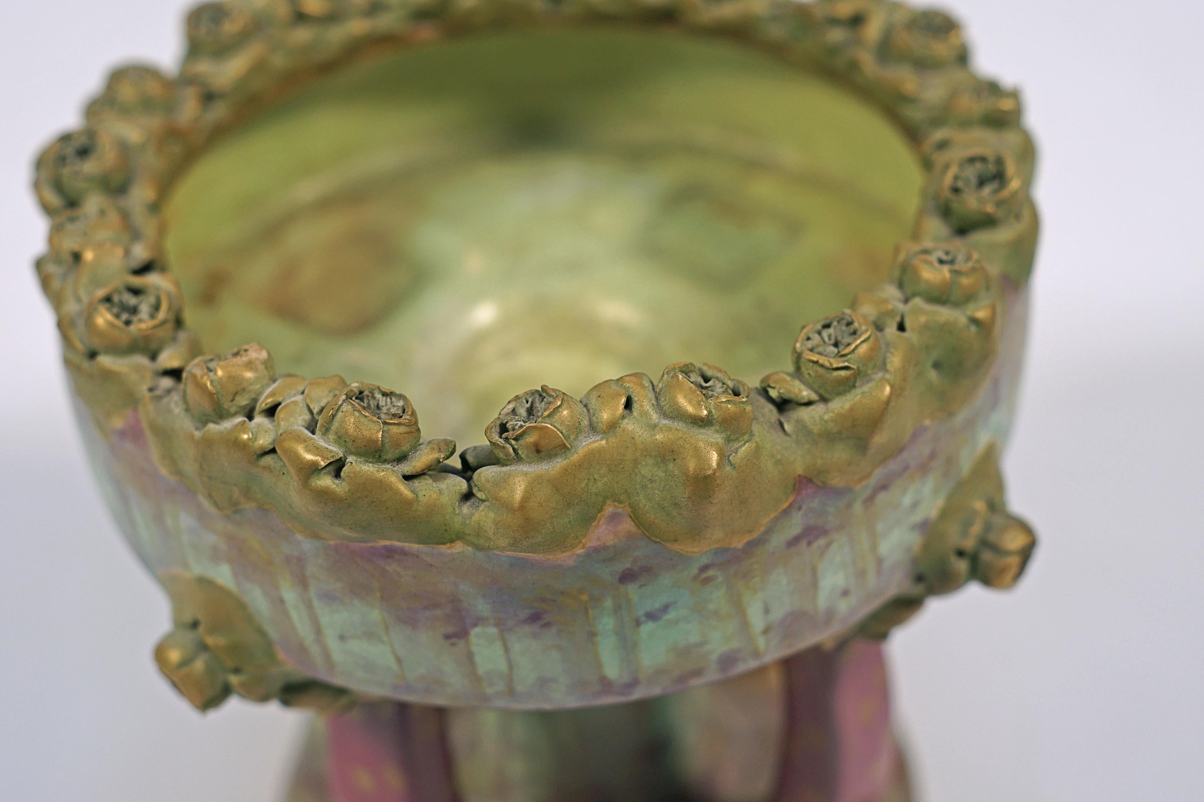 Art Nouveau ceramic fruit bowl stamped with a crown by, AUSTRIA AMPHORA 390042.

Austria, CIRCA 1900.