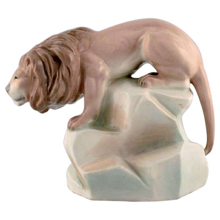 Amphora, Czechoslovakia, Hand-Painted Art Deco Porcelain Figurine of a Lion For Sale