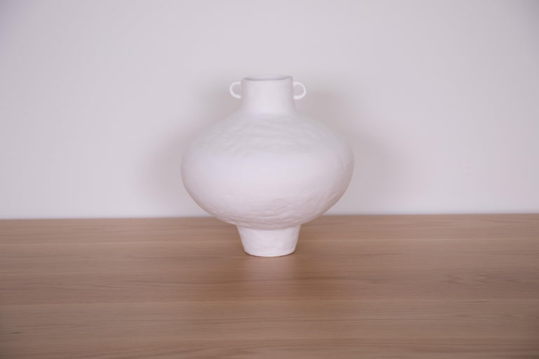 Hand-built terracotta vase in an amphora shape and painted white. Newly made in Spain.