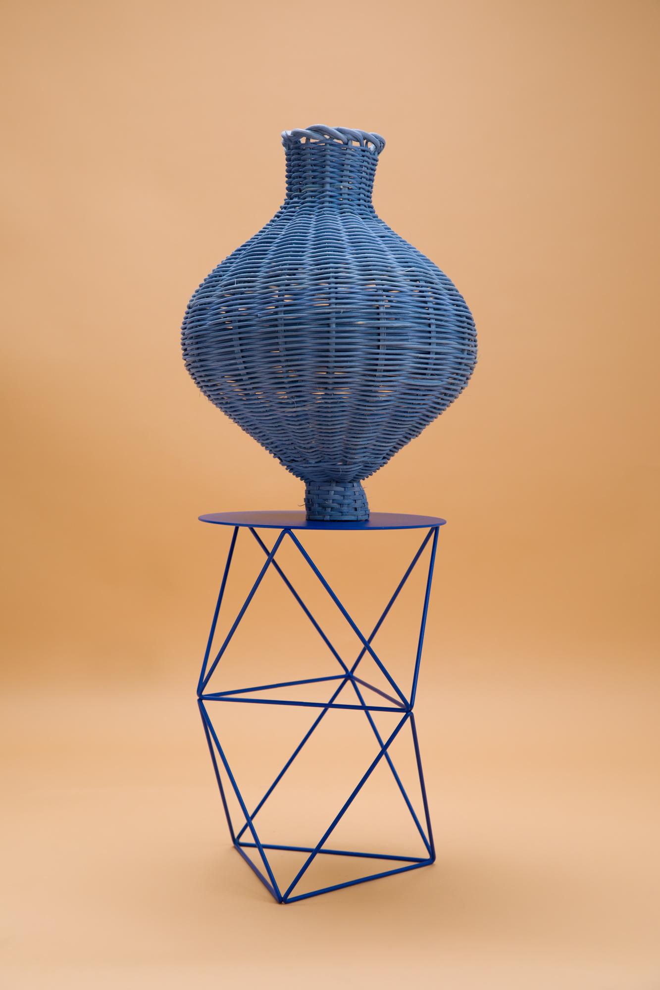 The Amphora Vase is hand dyed and woven with reed in our Chicago studio. Inspired by forms in ancient Greek ceramics, the material language of this vessel brings together the rich craft history of weaving with 3 dimensional form.

All of Studio