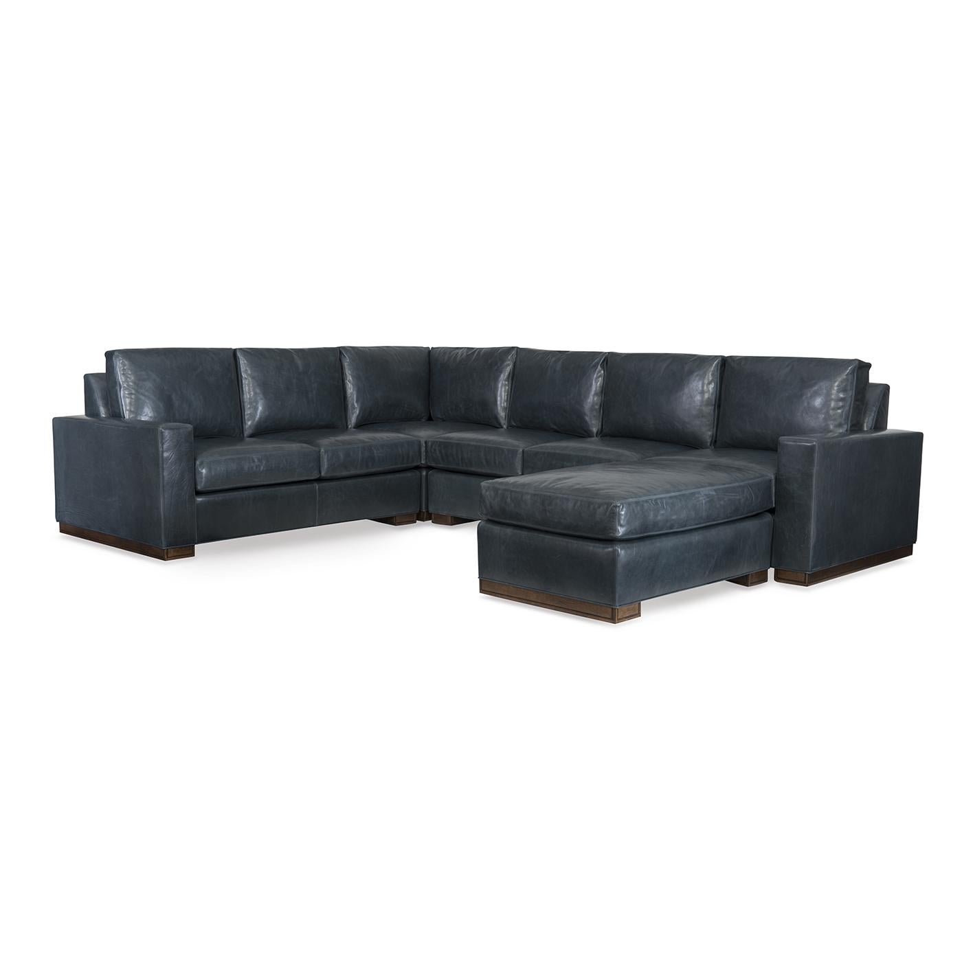 Modern leather upholstered sofa with bold modern lines and raised on bold block supports. Loose pillow backs with boxed comfort down seat cushions.

Completely Made in USA, with traditional 8-way hand-tied construction and US grown - toxin-free -