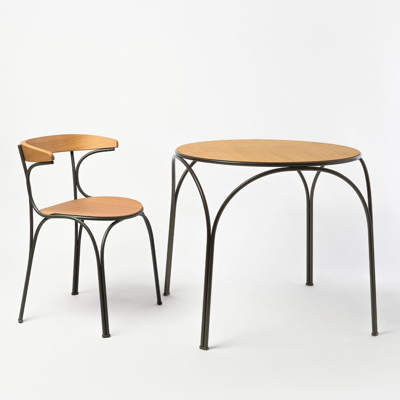 Nichetto Studio proudly introduces an elegant expansion of the Ample family: the Ample Bistrot Table, designed as versatile outdoor complements that seamlessly blend indoor and outdoor spaces. With sinuous shapes, generous proportions, and