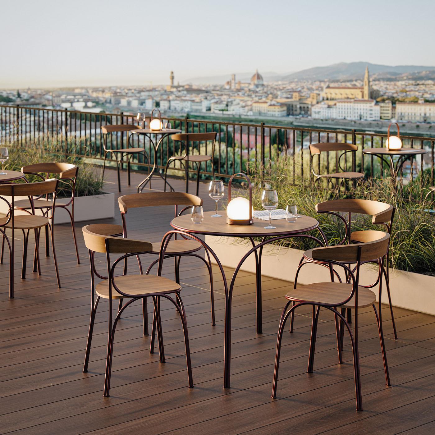 Nichetto Studio proudly presents an elegant extension of the Ample family: the Ample Outdoor Chair. This versatile outdoor piece seamlessly harmonizes indoor and outdoor spaces. The Ample Outdoor Chair offers an outdoor version, preserving the