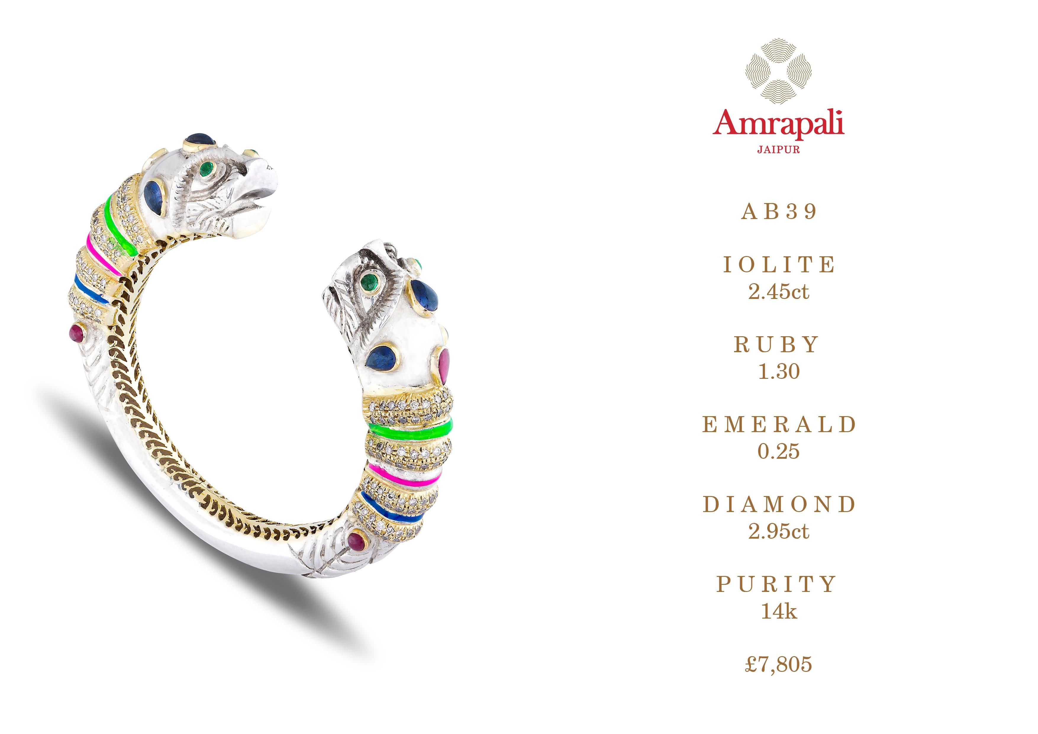 Amrapali Jewels 14k gold, Iolite, Emerald, Ruby & Diamond bangle 

Iolite weight - 2.45ct
Emerald weight - 0.25ct
Ruby weight  - 1.30ct
Diamond weight - 2.95

Size - 6


