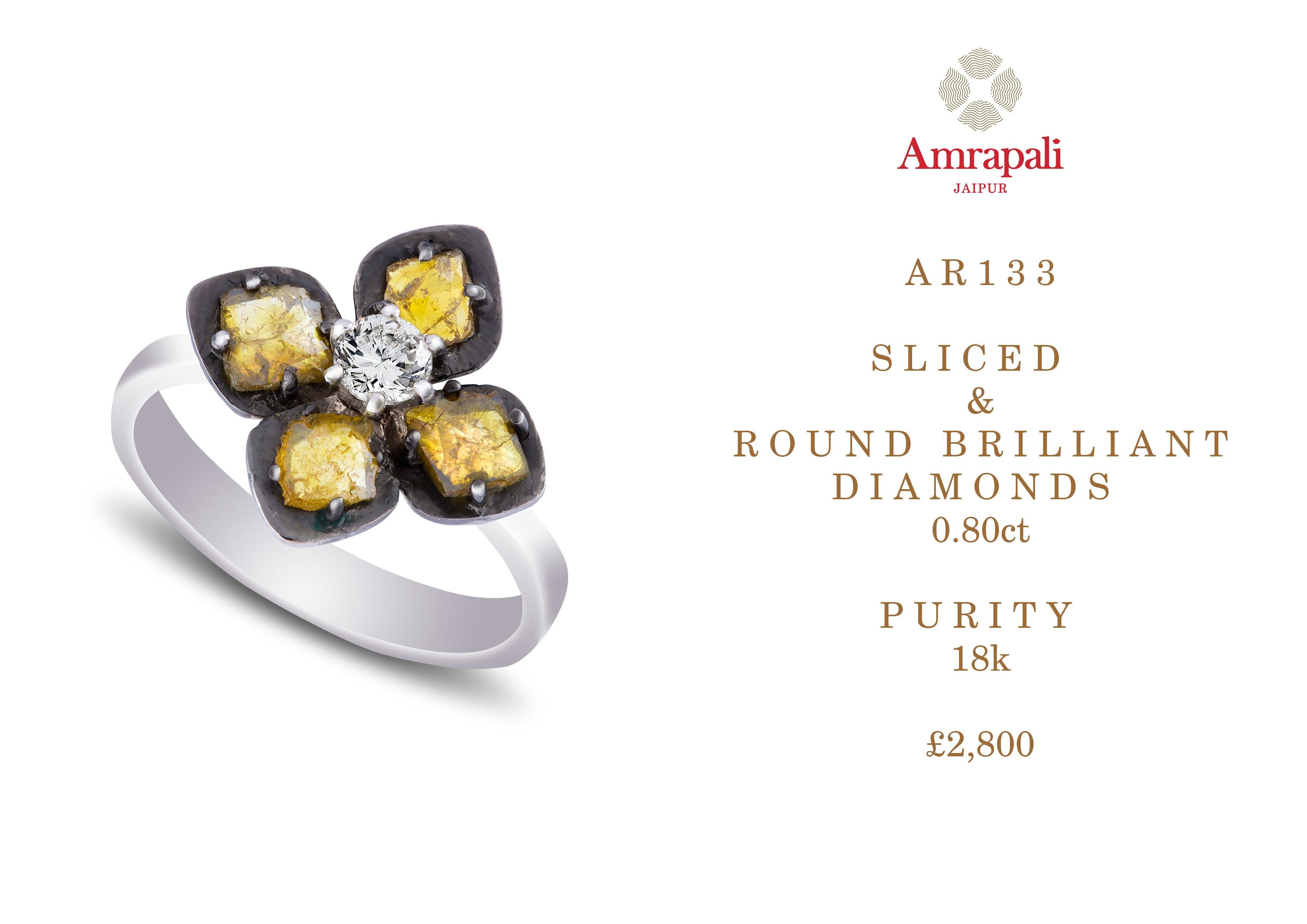 Amrapali Jewels 18k gold, yellow & white Diamond ring  

Diamond weight - 0.8ct total 

Diamond cut - Sliced Light yellow diamond Earrings 
Centre diamond cut - White round brilliant diamond 

Ring size - 53


