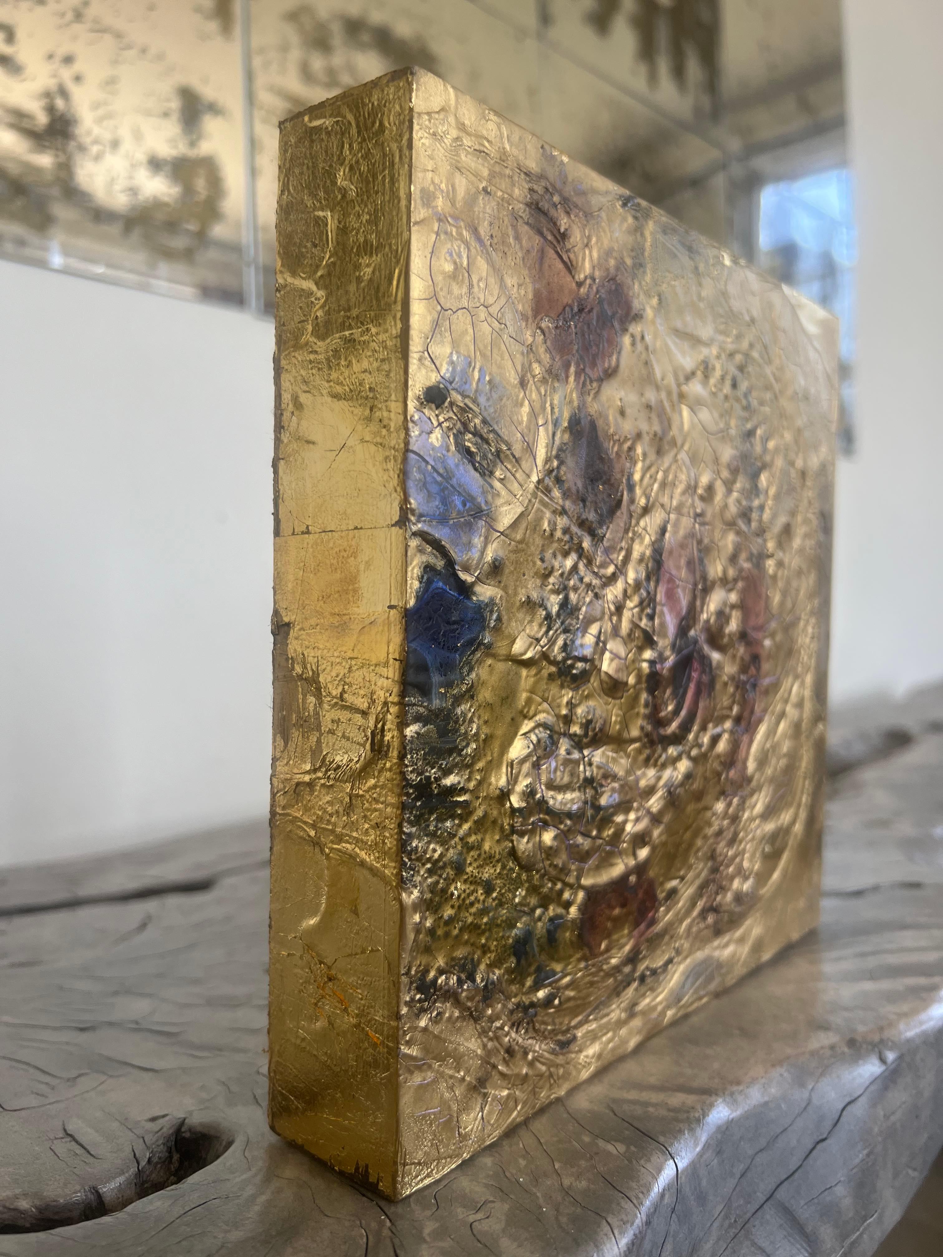 This piece is part of the Amrta Gold Series. These pieces are incredibly unique and cannot be replicated. The are multilayered mixed media abstracts all with 24k gold leaf on top. The layers are danced, dripped, and splattered onto wood panels to