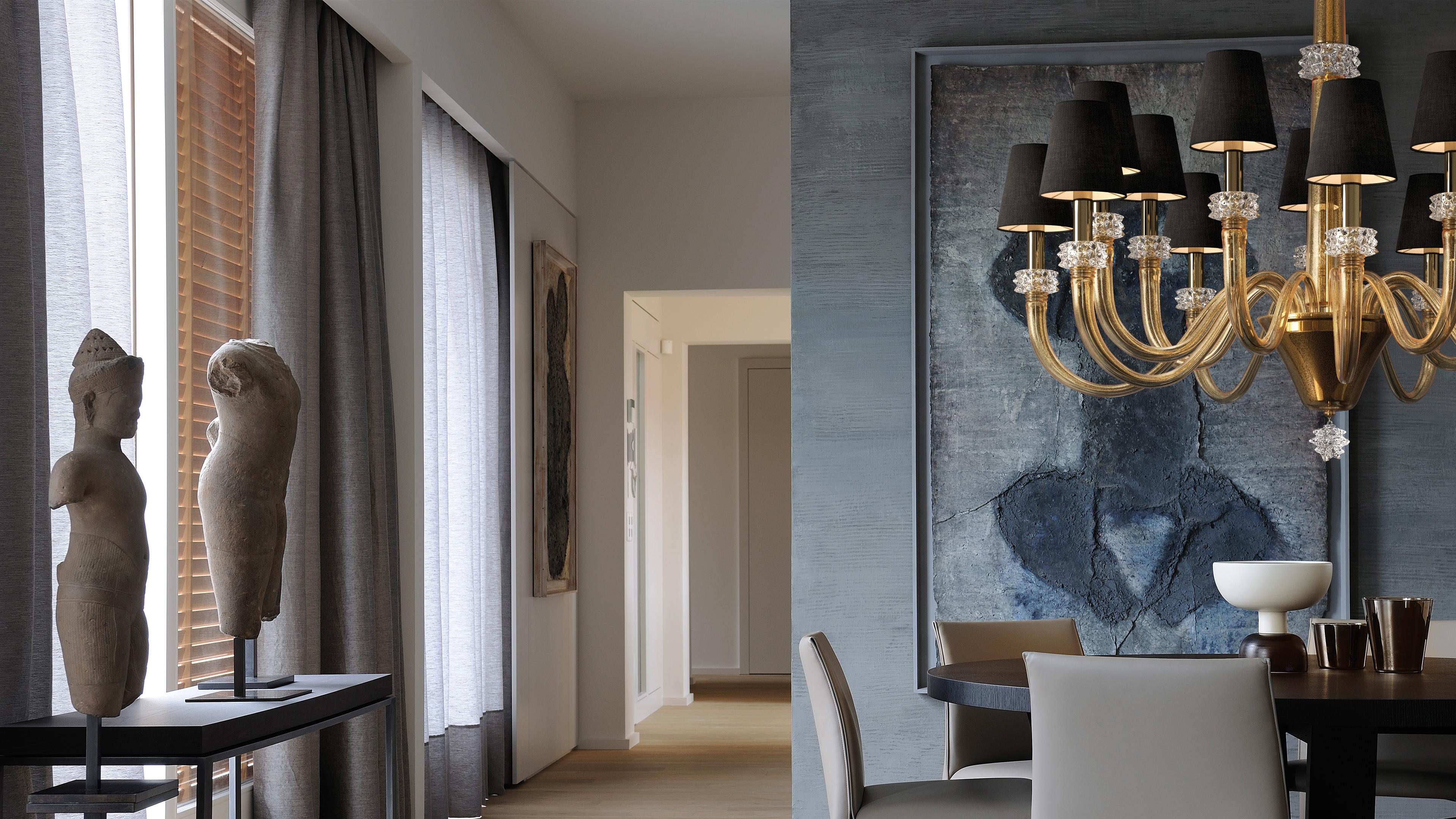 A collection of chandeliers in soft colors, where chunky crystal cylinders reflect and refract the light to dramatic effect: it is the 