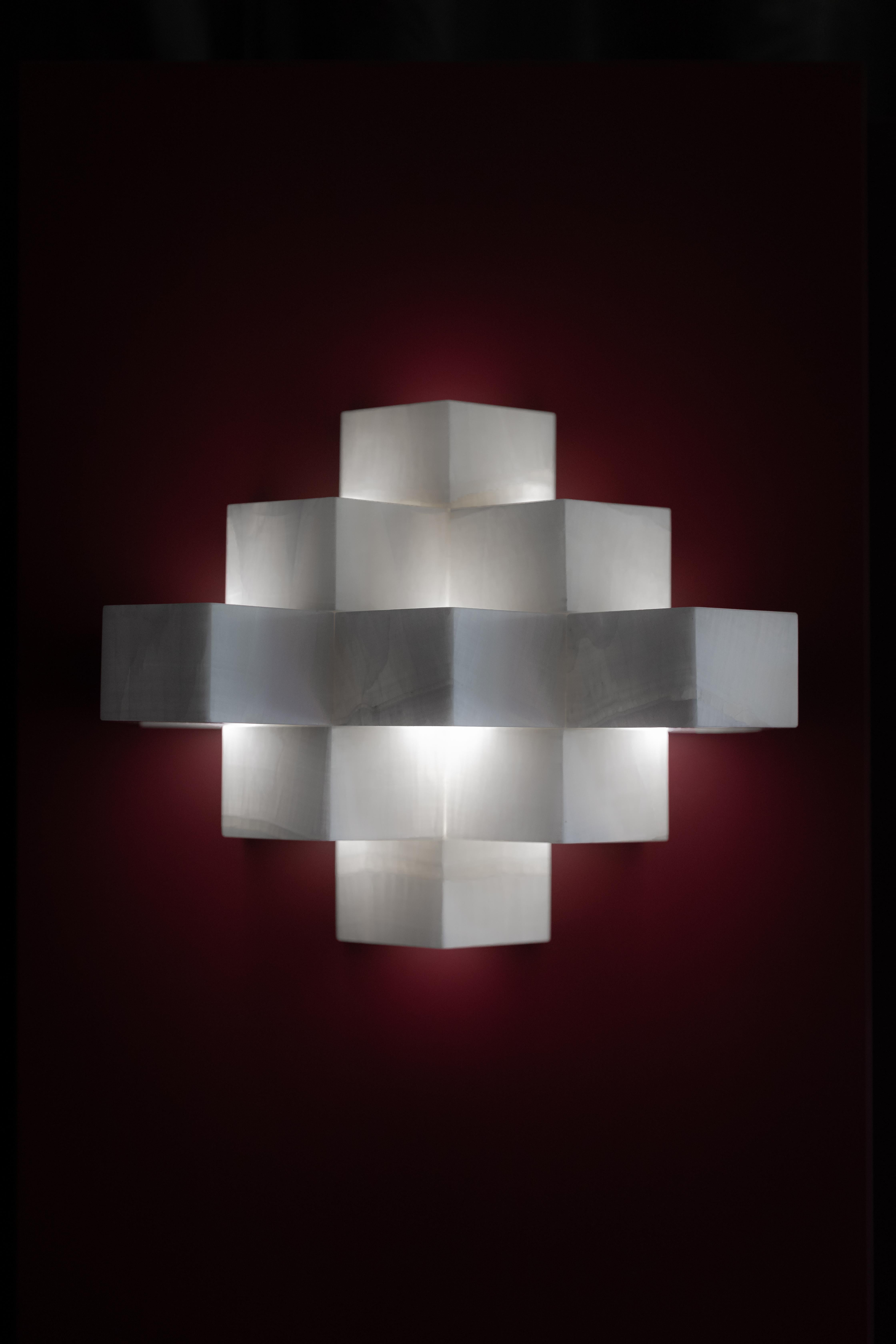 Amsterdam School 9 Bricks Sconce by Former Matter
Dimensions: W 32.4 x D 28.2 x H 27 cm.
Materials: Solid Onyx,
Weight: 21 Kg.

By studying the history of design and precious materials, each created object has a deep meaning and historical