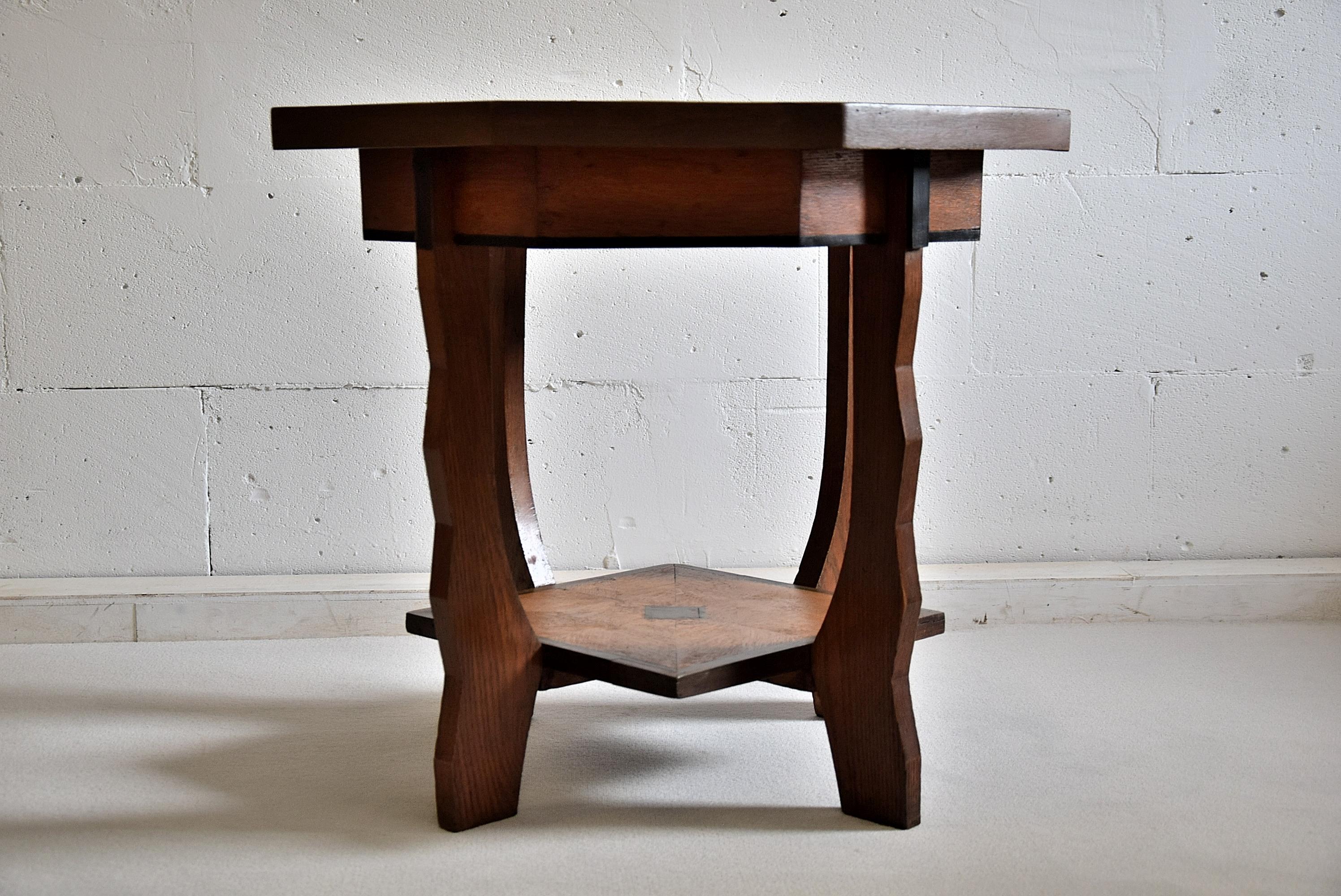Sophisticated oak and rosewood Art Deco Amsterdam School two-tier side table.
Measurements: W 69 x D 69 x H 63 cm.
The table will be shipped overseas in a custom made wooden crate. Cost of transport to the US crate included is Euro 525.

The