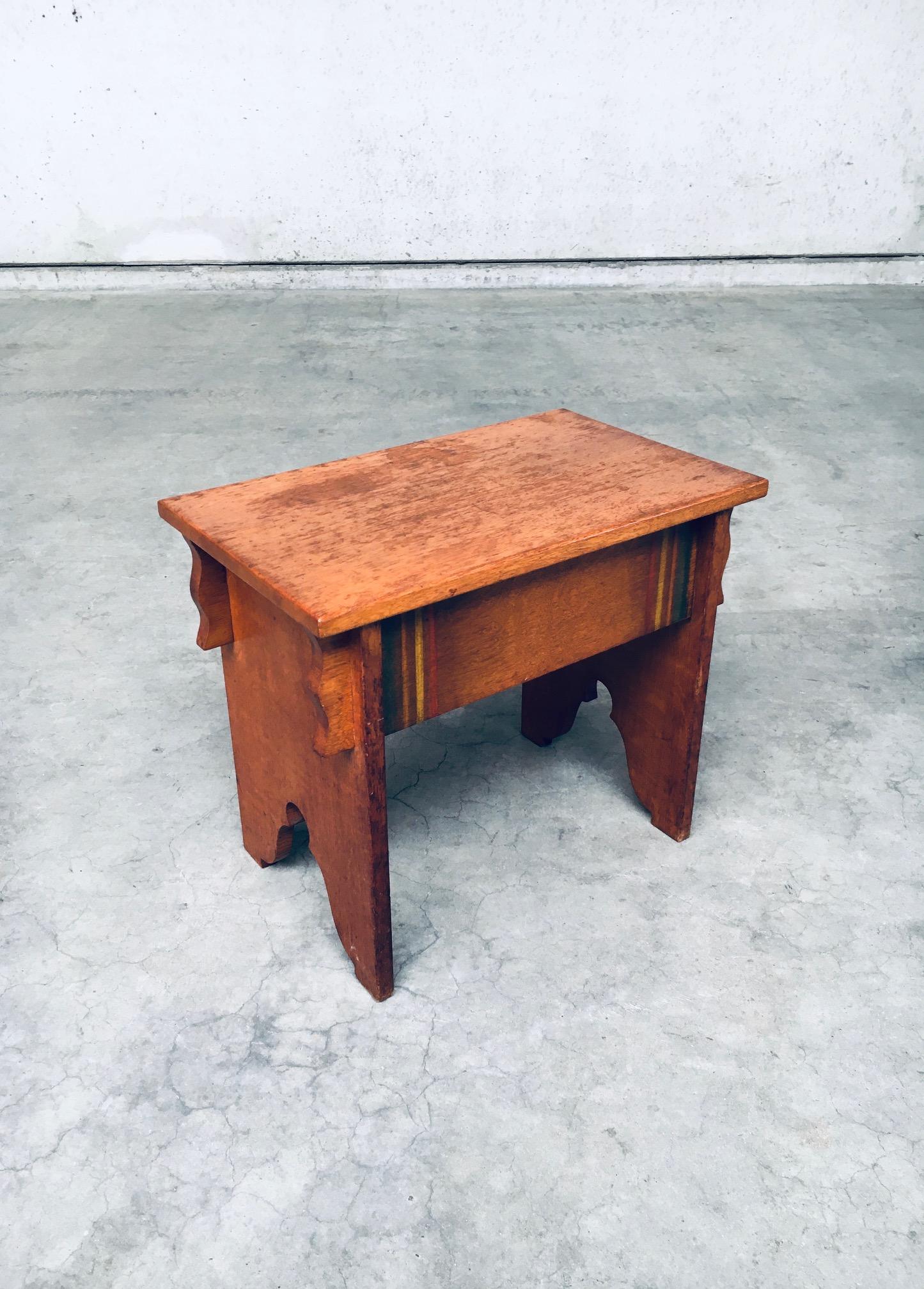 Early 20th Century Arts & Crafts Amsterdam School Design Side Table. Made in the Netherlands, Amsterdam Region in the early part of the 20th Century, 1920's period. Solid oak constructed side table with painted features on the front and back panels.