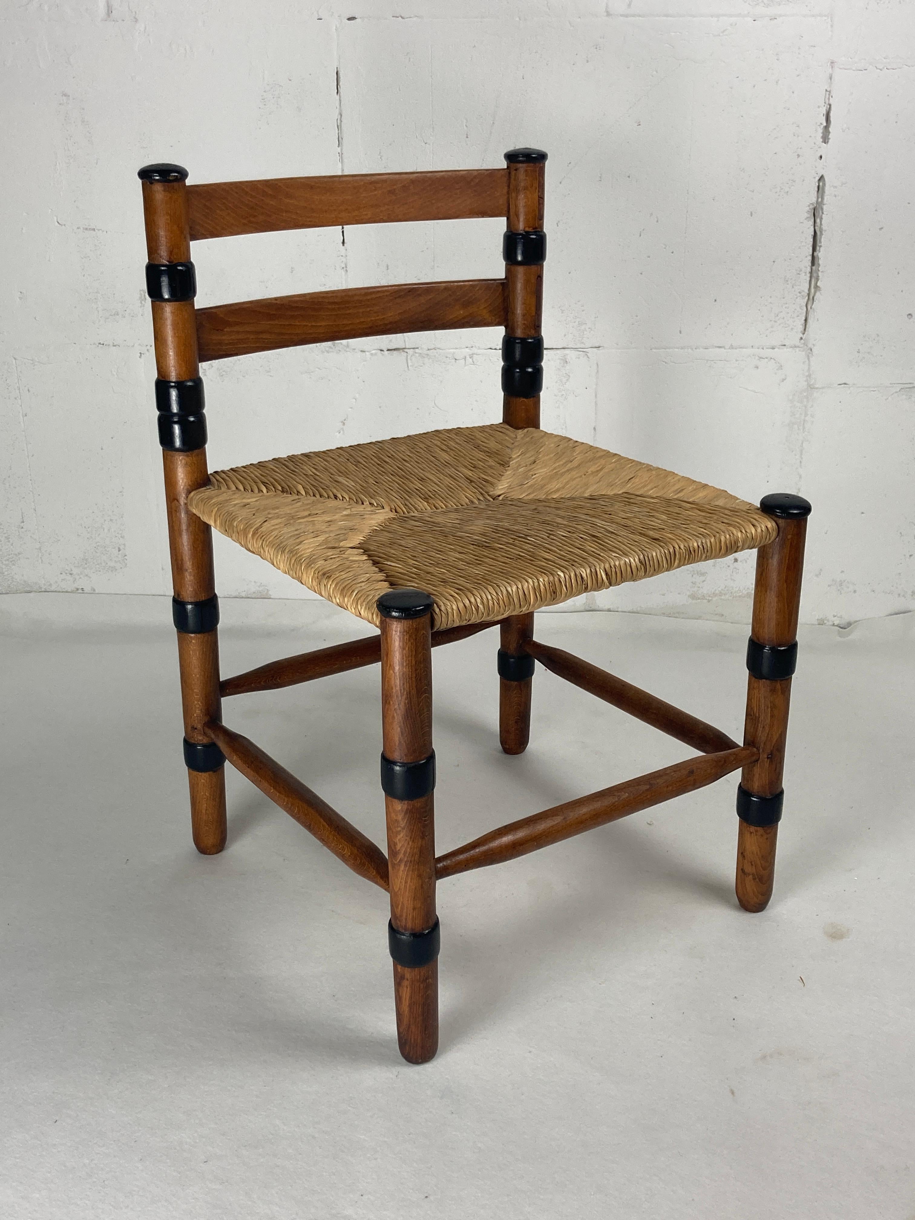 An exceptionally rare low side chair with rush seat made in the netherlands around 1930s by jac. Levee. There is some debate regarding the chair as some have suggested that this is a prototype or a test model from levees workplace. The dining chairs